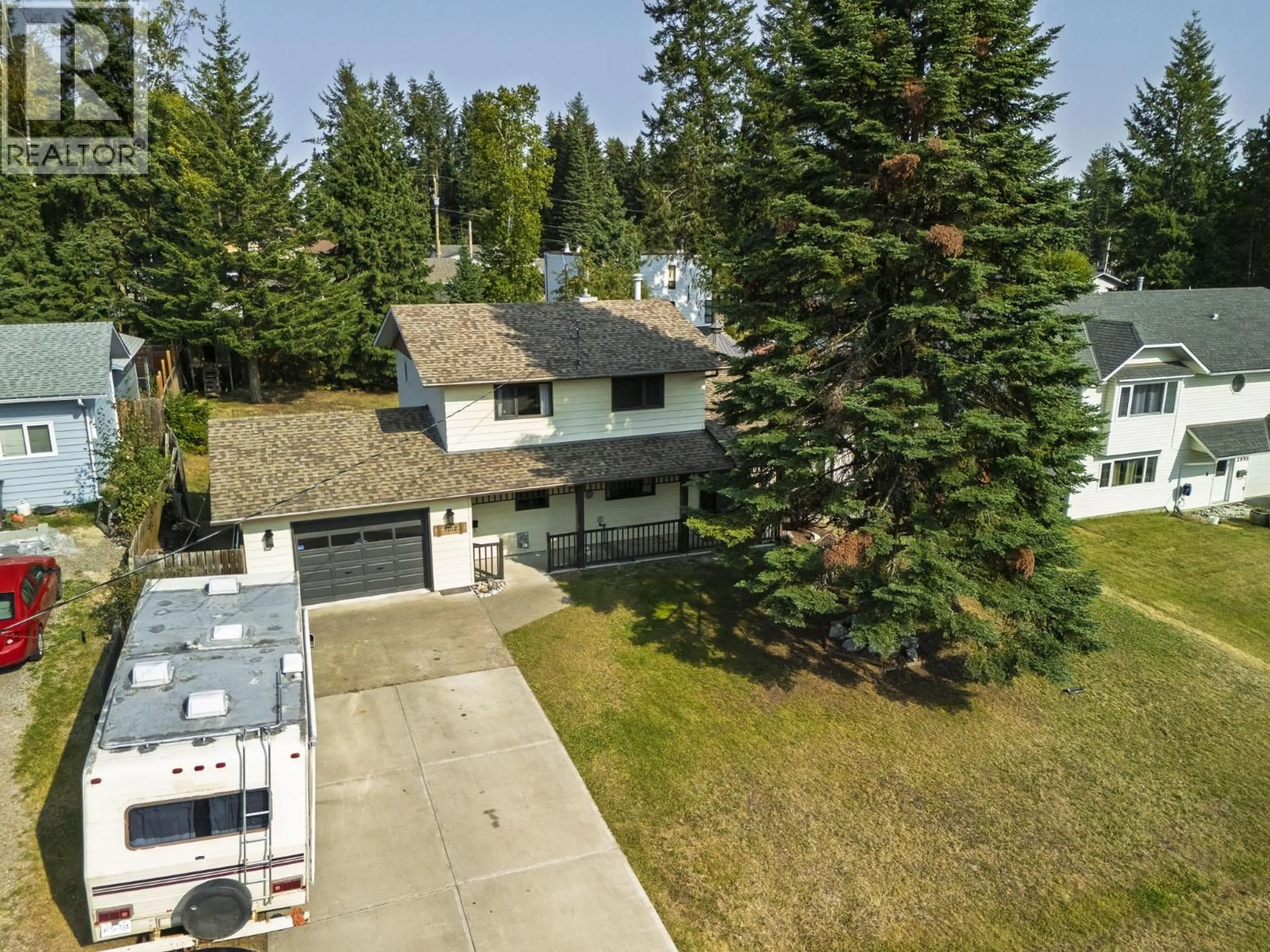 A pic from outside/outdoor area/front of a property/back of a property/a pic from drone, street for 3012 BERWICK DRIVE, Prince George British Columbia V2K3R7