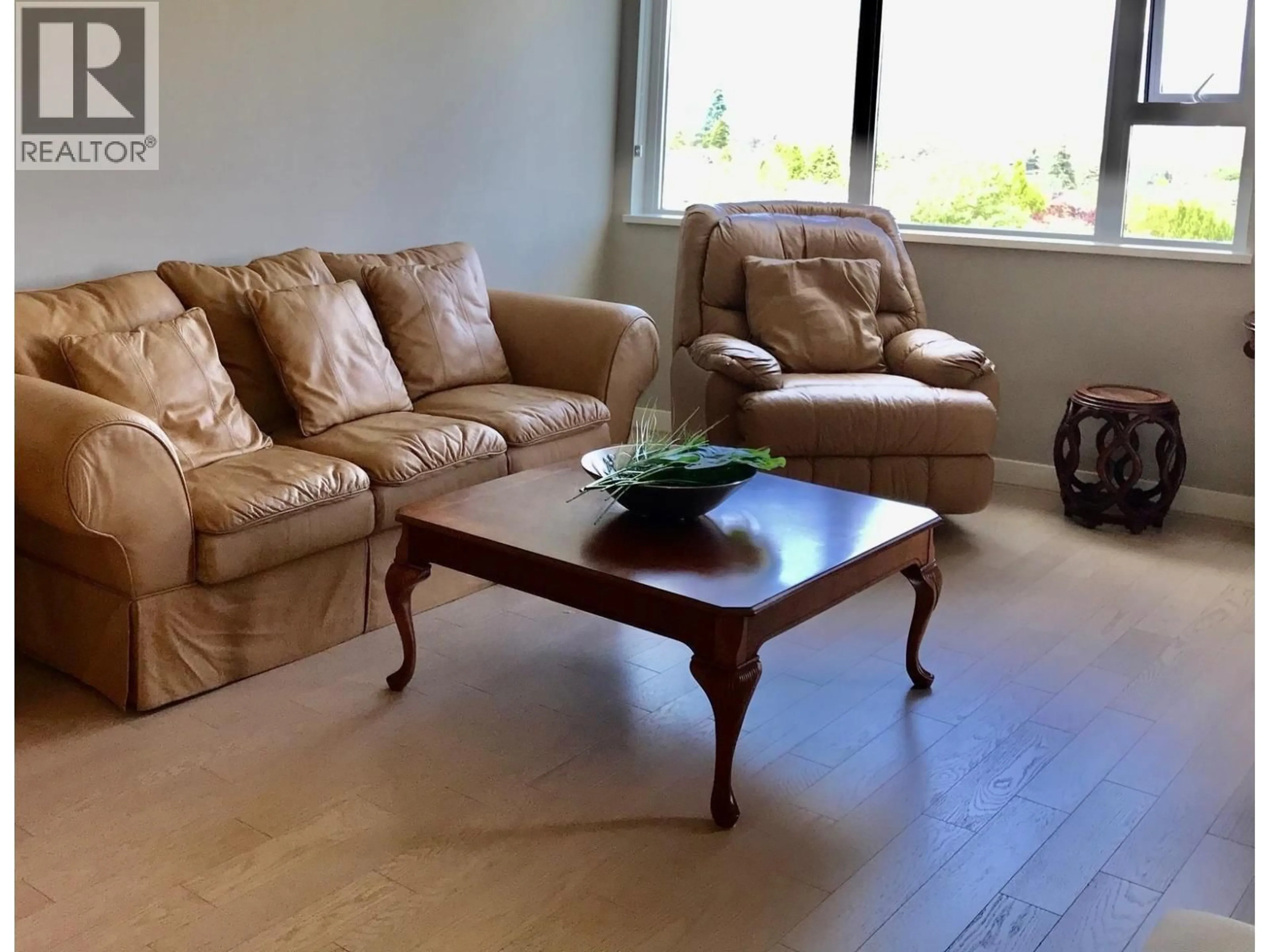 Living room with furniture, wood/laminate floor for 513 - 508 29TH AVENUE, Vancouver British Columbia V5Z2H7
