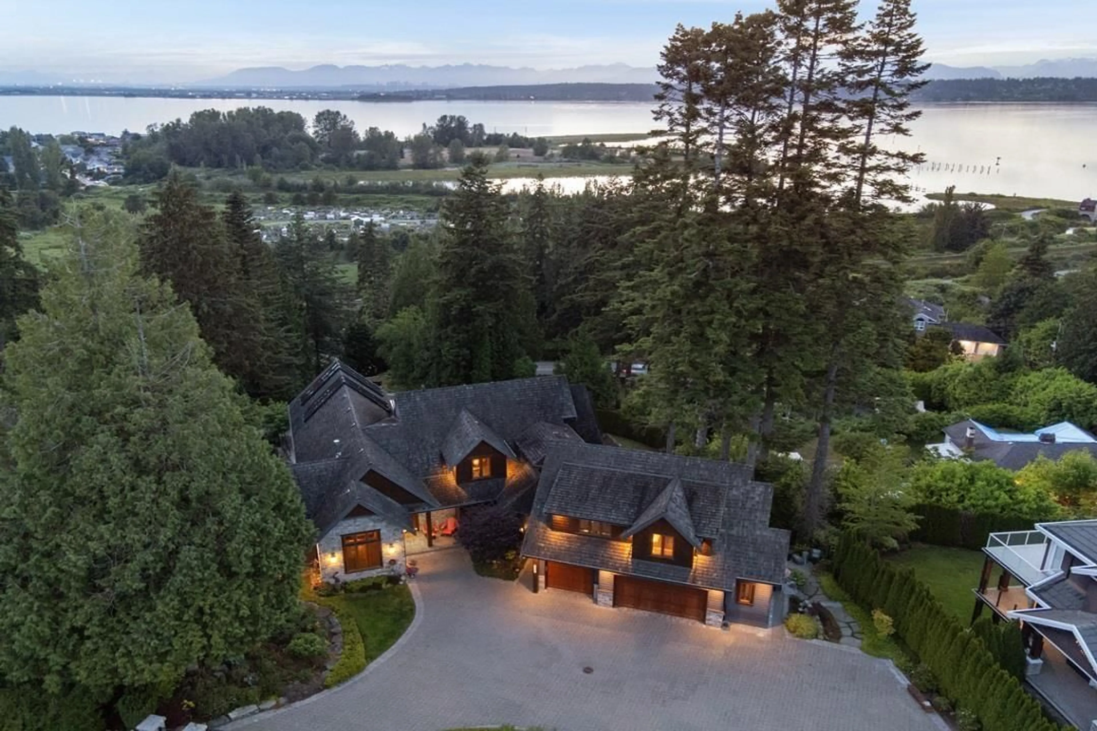 A pic from outside/outdoor area/front of a property/back of a property/a pic from drone, water/lake/river/ocean view for 12503 28, Surrey British Columbia V4A2N8