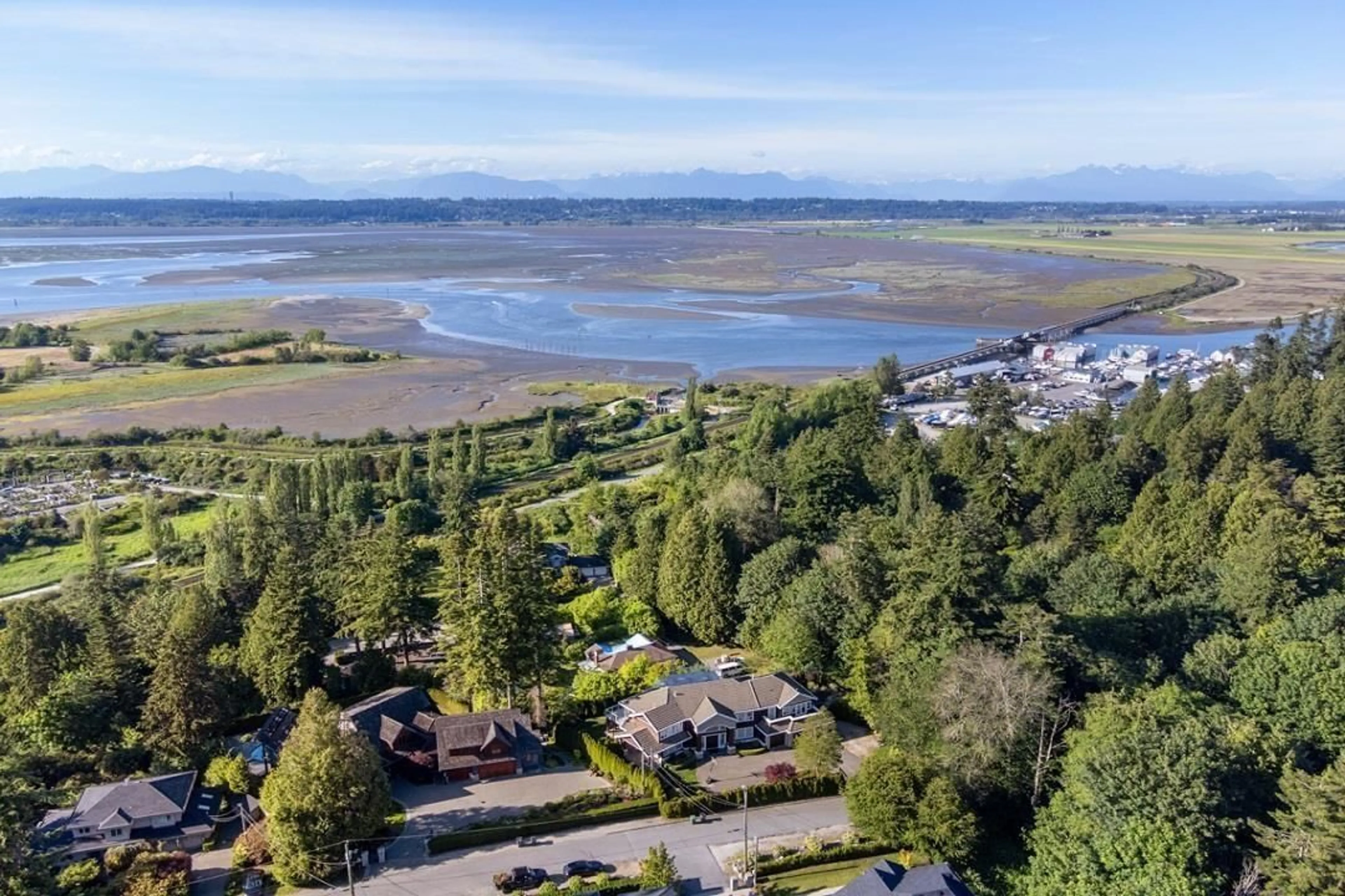 A pic from outside/outdoor area/front of a property/back of a property/a pic from drone, water/lake/river/ocean view for 12503 28, Surrey British Columbia V4A2N8