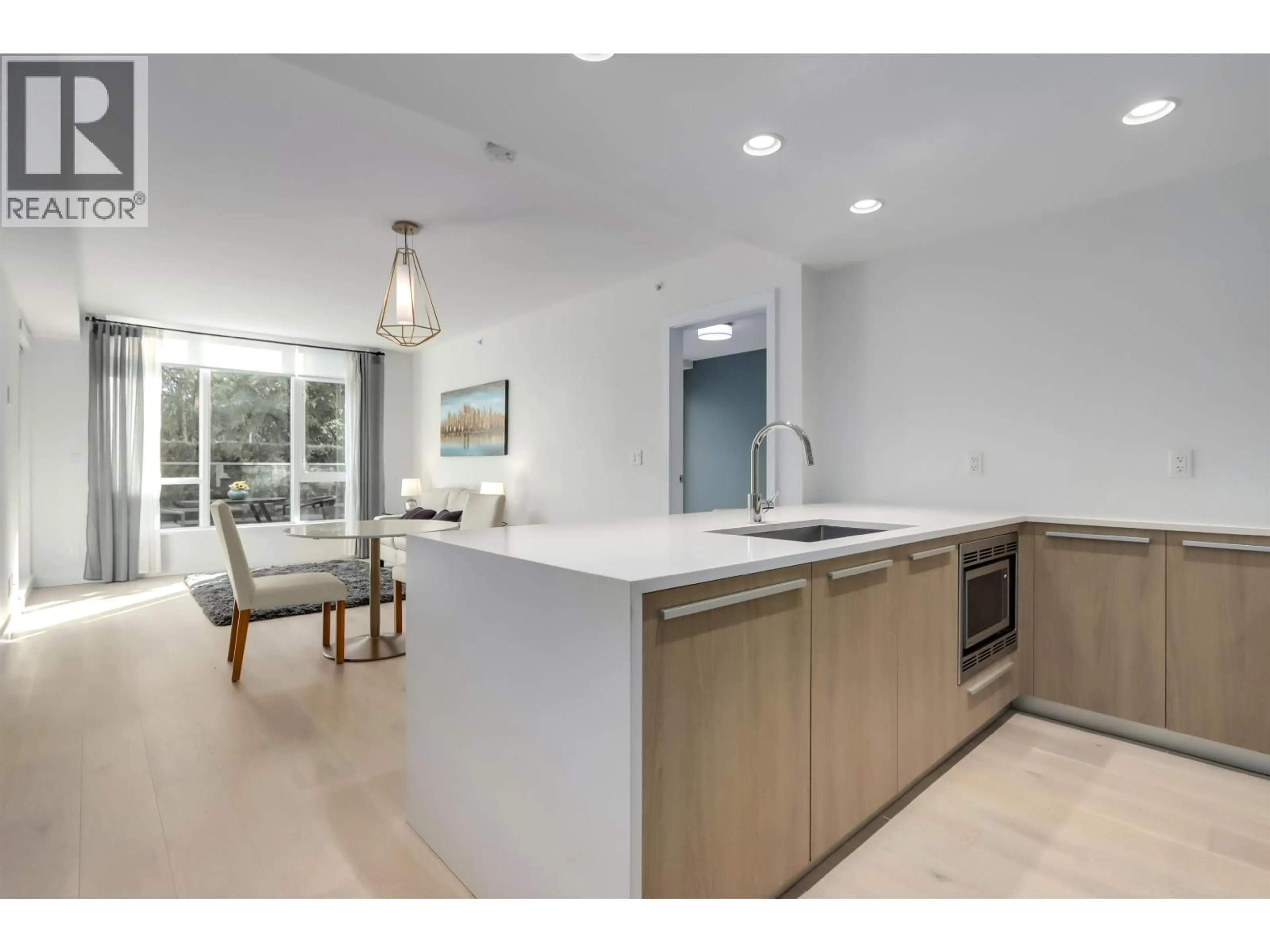 Open concept kitchen, unknown for 105 - 1295 CONIFER STREET, North Vancouver British Columbia V7J0B4