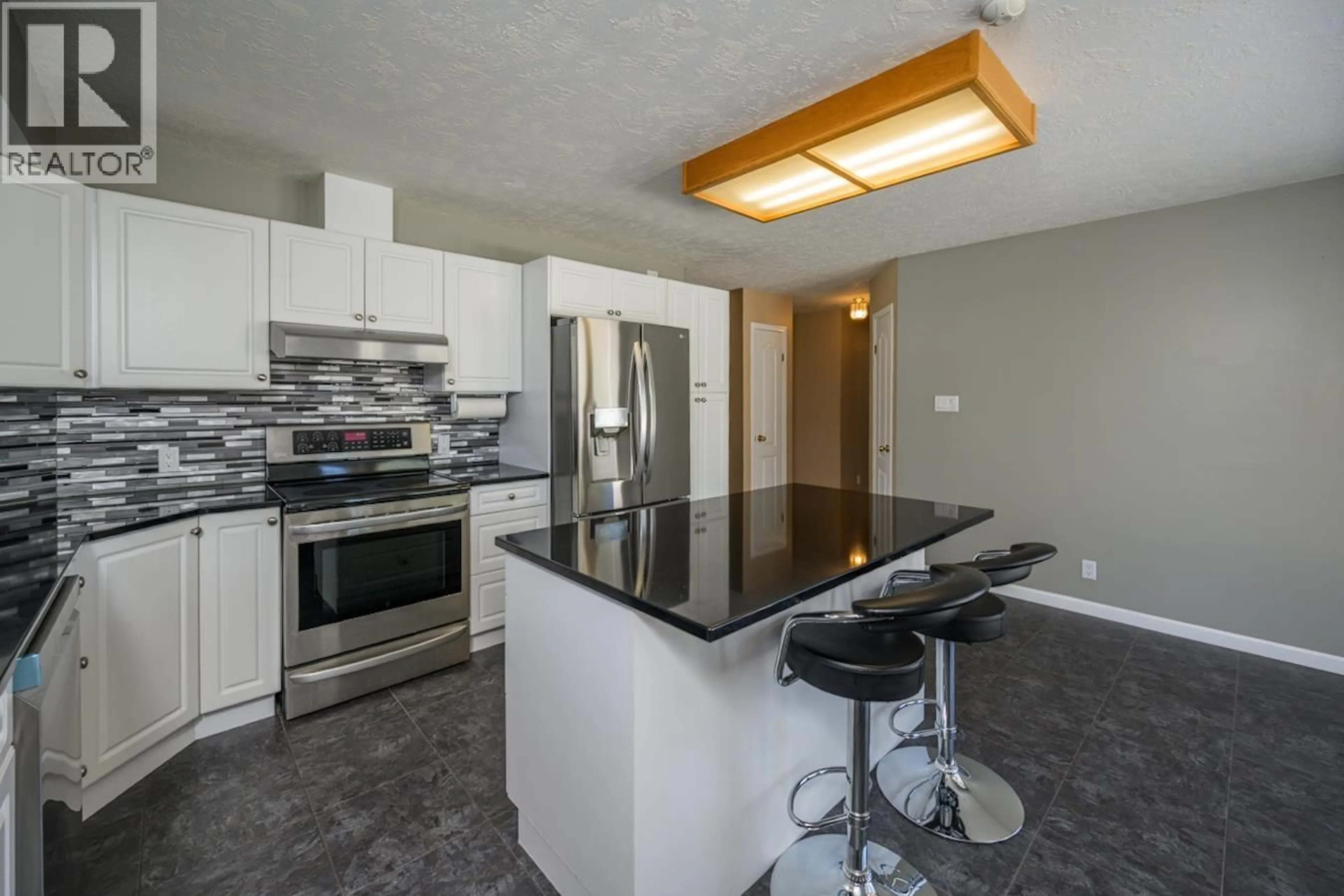 Open concept kitchen, ceramic/tile floor for 3172 SETON PLACE, Prince George British Columbia V2K4T7