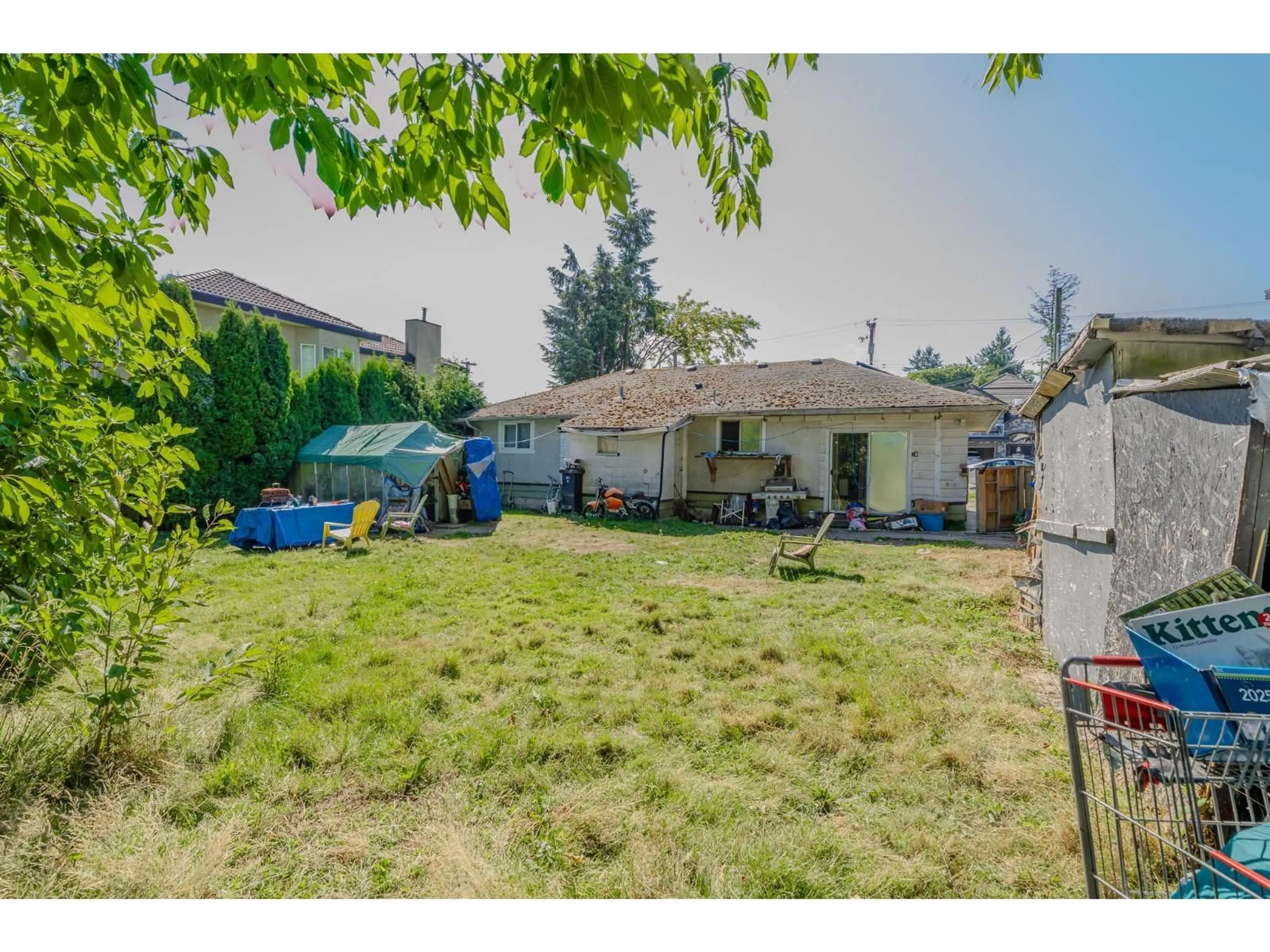 A pic from outside/outdoor area/front of a property/back of a property/a pic from drone, street for 12111 84, Surrey British Columbia V3W3G4