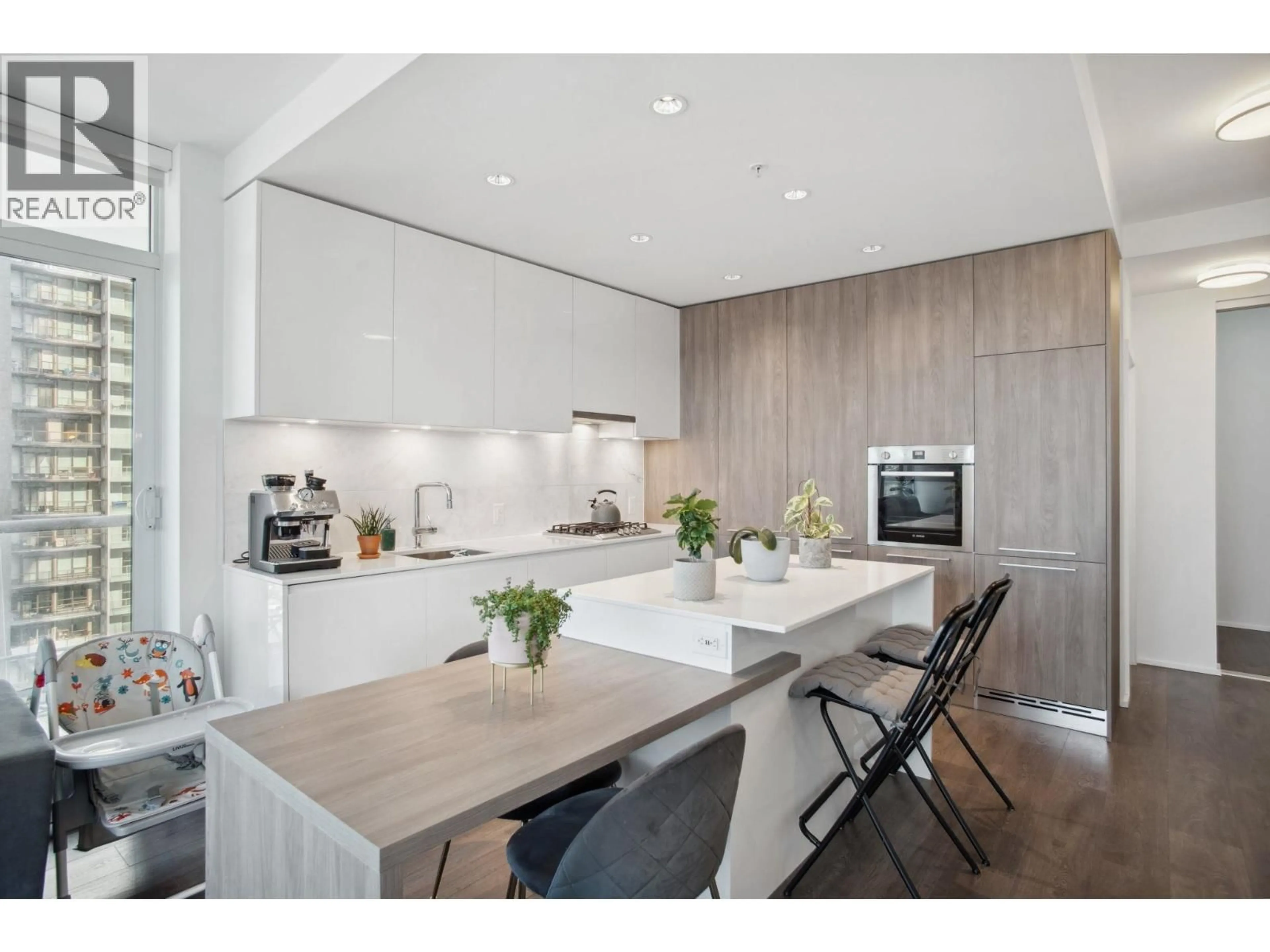 Open concept kitchen, wood/laminate floor for 2812 - 1955 ALPHA WAY, Burnaby British Columbia V5C0K6
