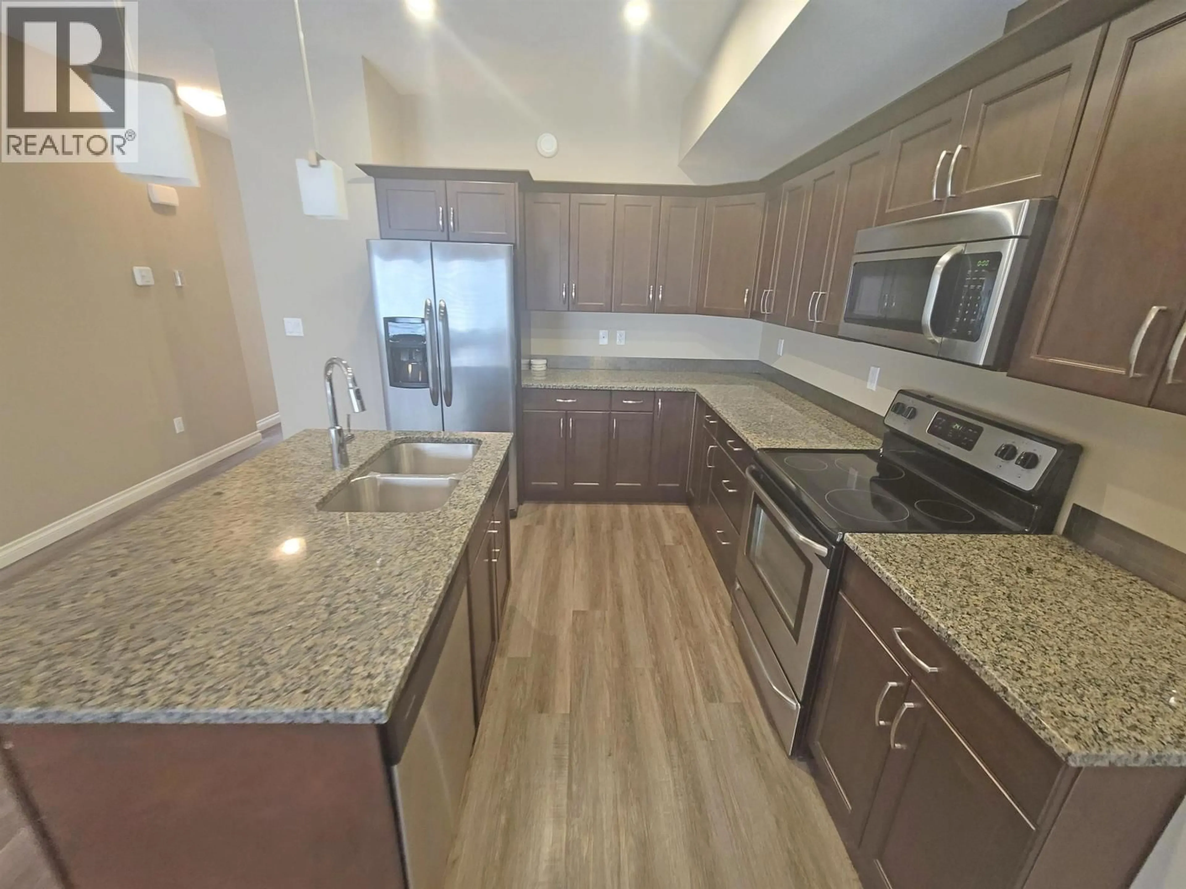 Open concept kitchen, unknown for 8713 82 STREET, Fort St. John British Columbia V1J0P5