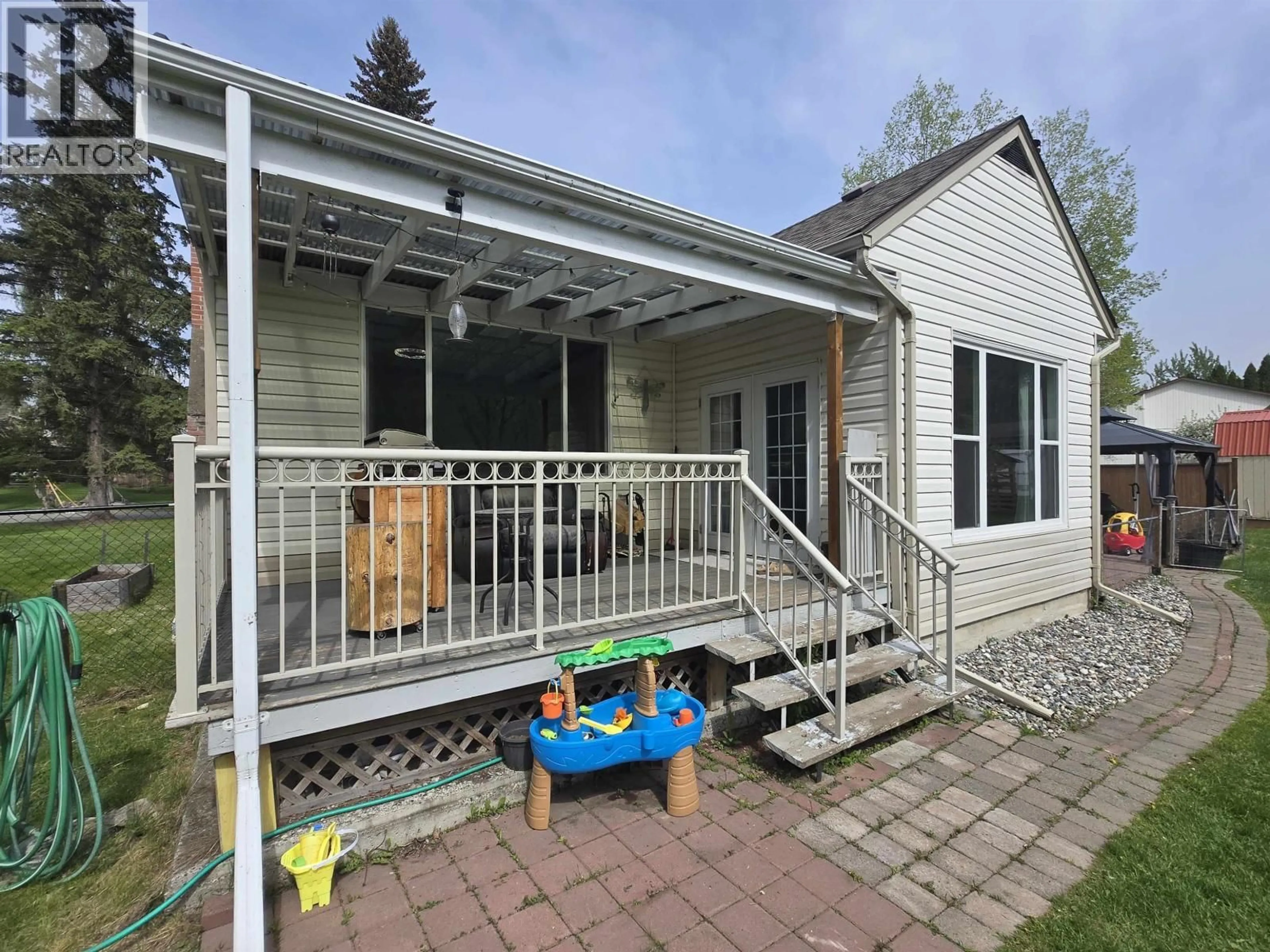 Home with vinyl exterior material, street for 1384 MOFFAT AVENUE, Quesnel British Columbia V2J3A7