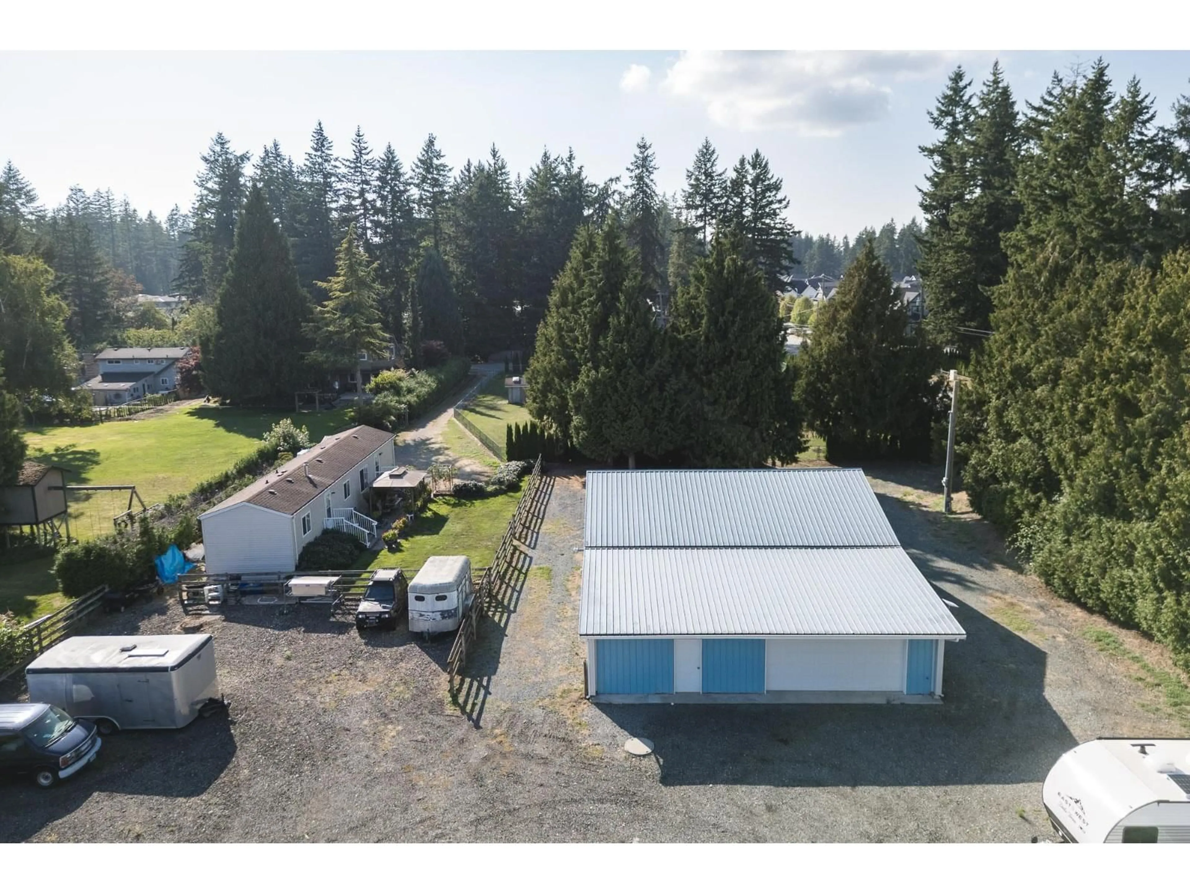 A pic from outside/outdoor area/front of a property/back of a property/a pic from drone, building for 2794 204, Langley British Columbia V2Z2B8