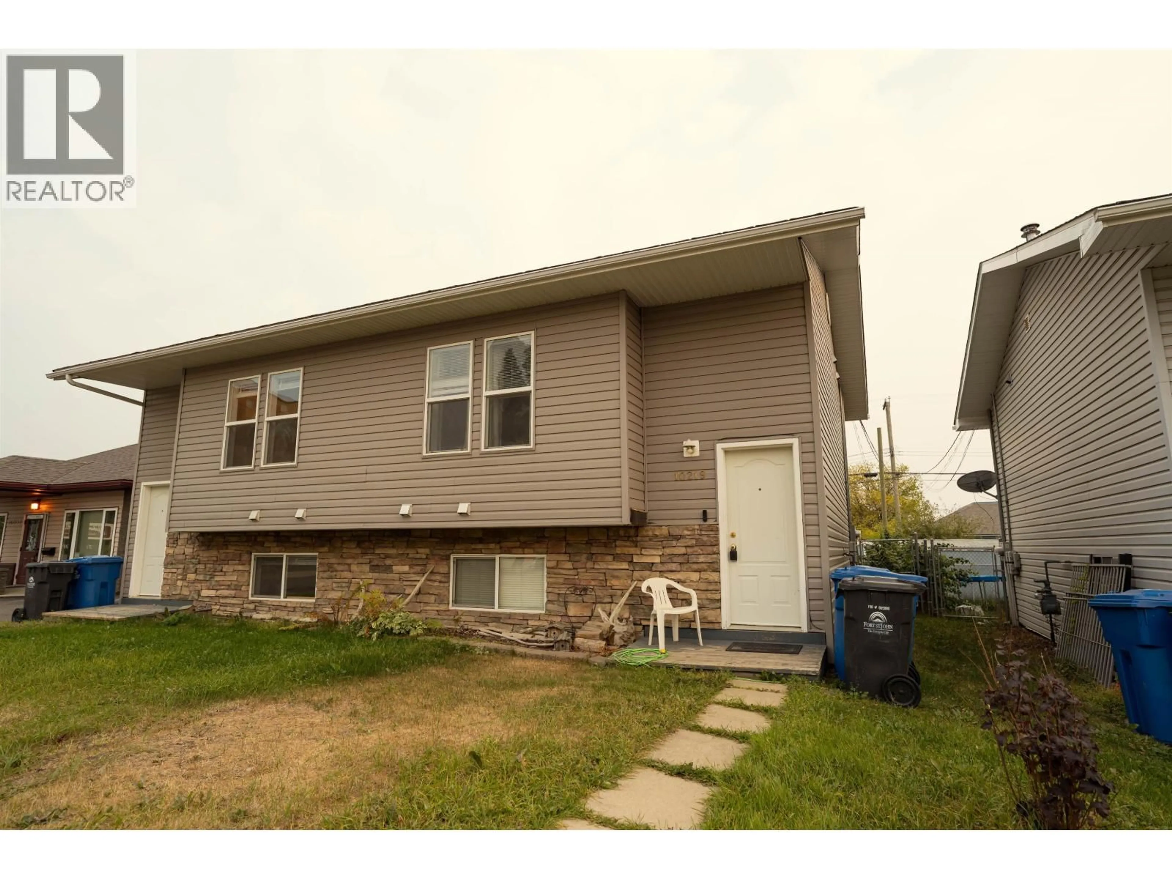 Home with vinyl exterior material, street for 10219 102 AVENUE, Fort St. John British Columbia V1J2E4