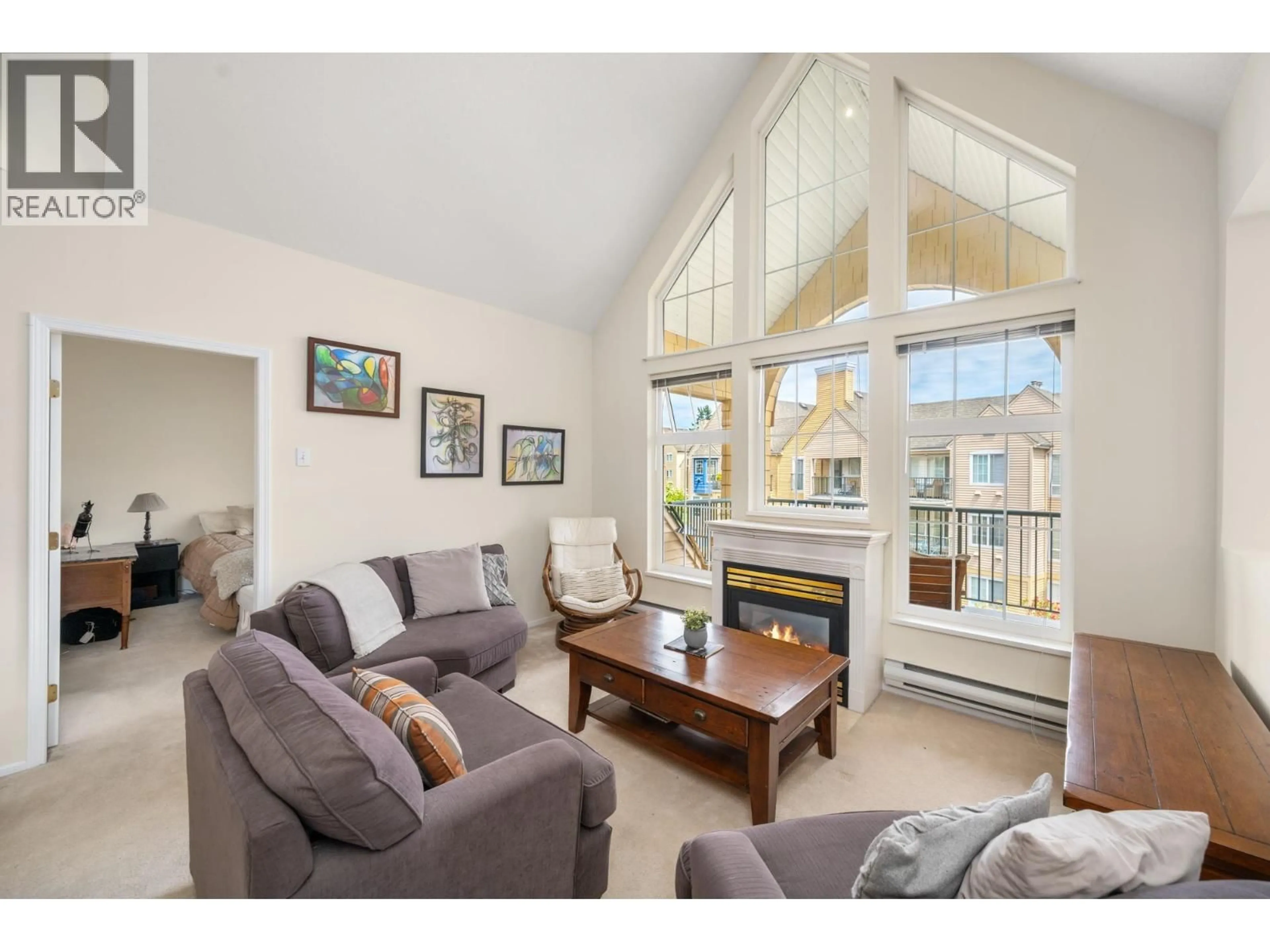 Living room with furniture, wood/laminate floor for 5555 13A AVENUE, Tsawwassen British Columbia V4M2E7