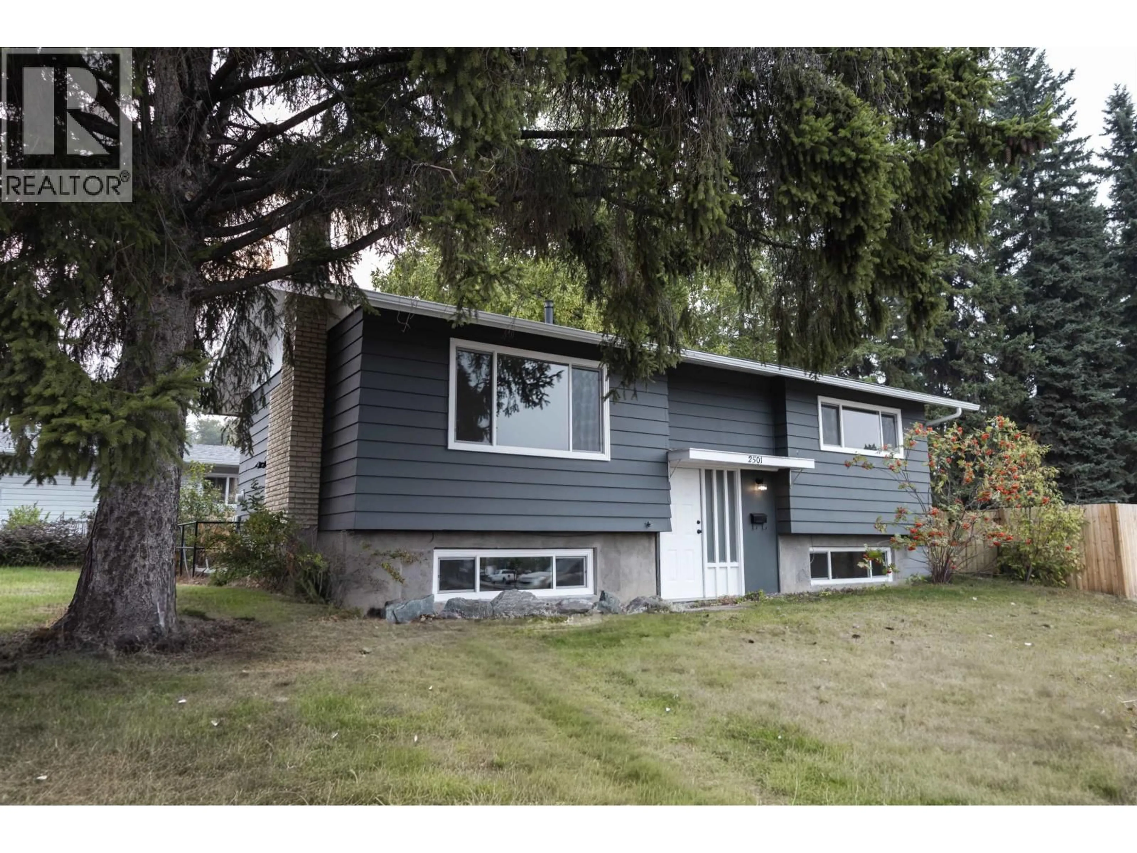 Home with vinyl exterior material, street for 2501 WESTWOOD DRIVE, Prince George British Columbia V2N1R1