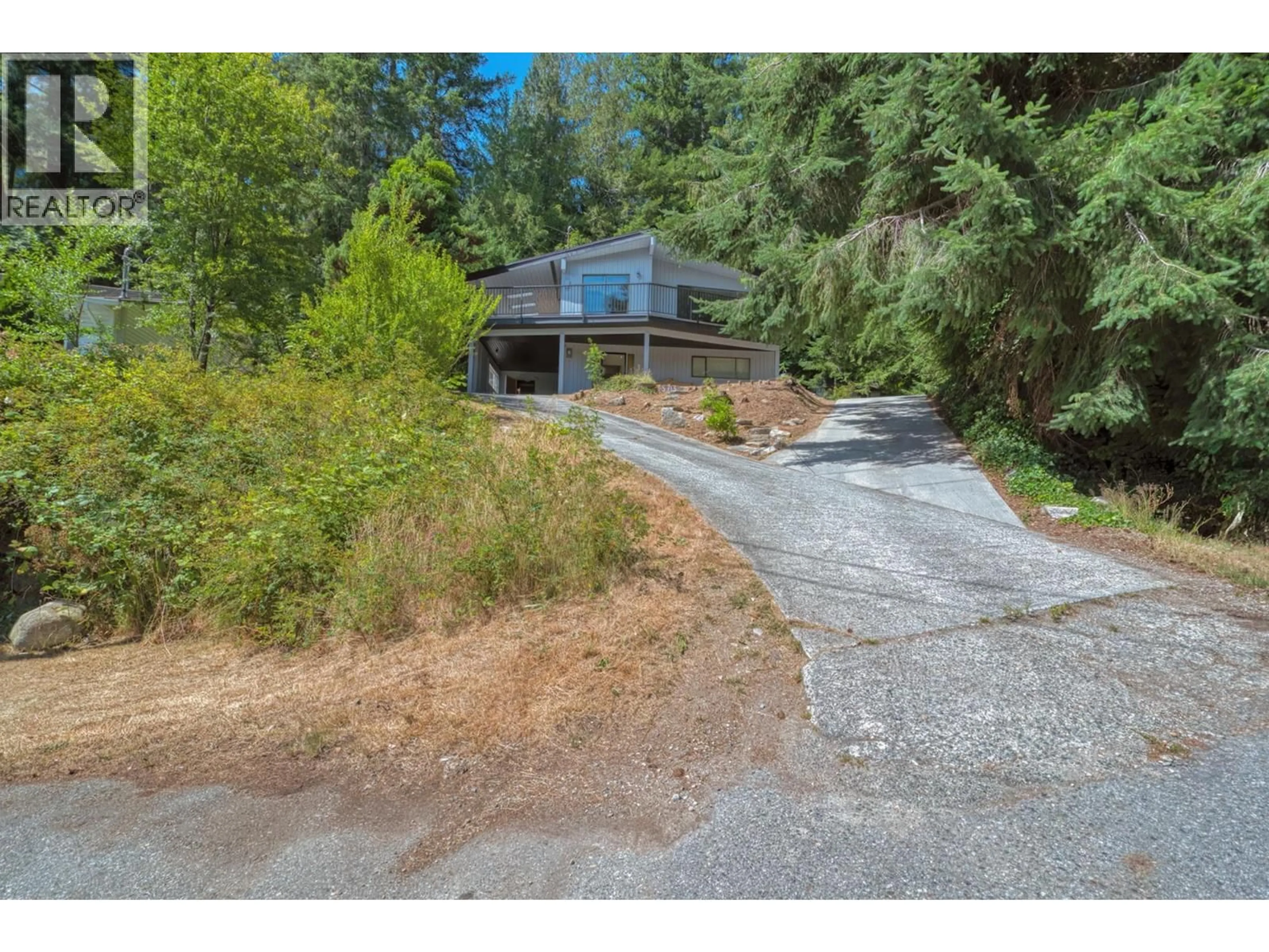 A pic from outside/outdoor area/front of a property/back of a property/a pic from drone, unknown for 5713 SALMON DRIVE, Sechelt British Columbia V0N3A0