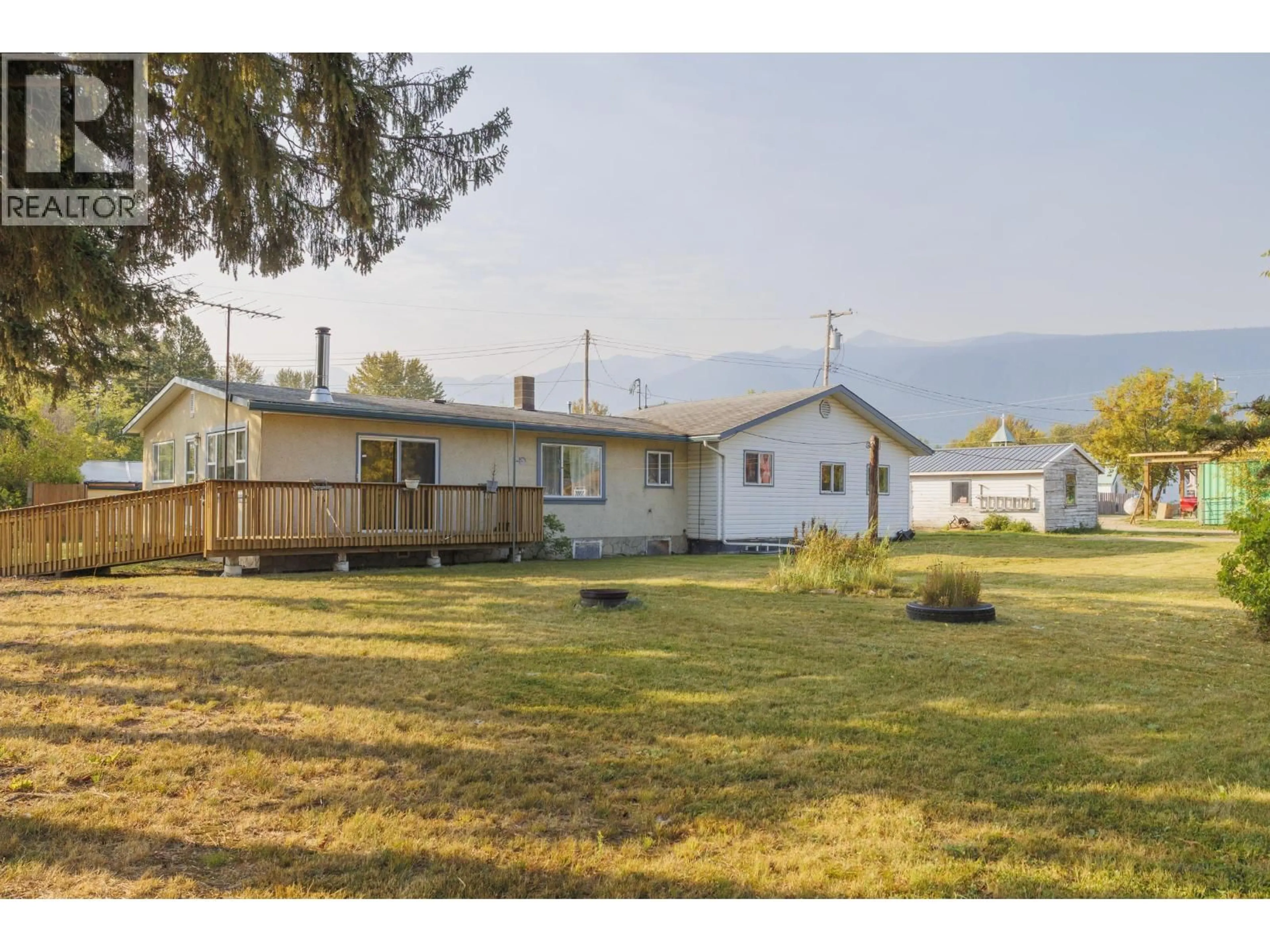 A pic from outside/outdoor area/front of a property/back of a property/a pic from drone, mountain view for 1155 3RD AVENUE, McBride British Columbia V0J2E0
