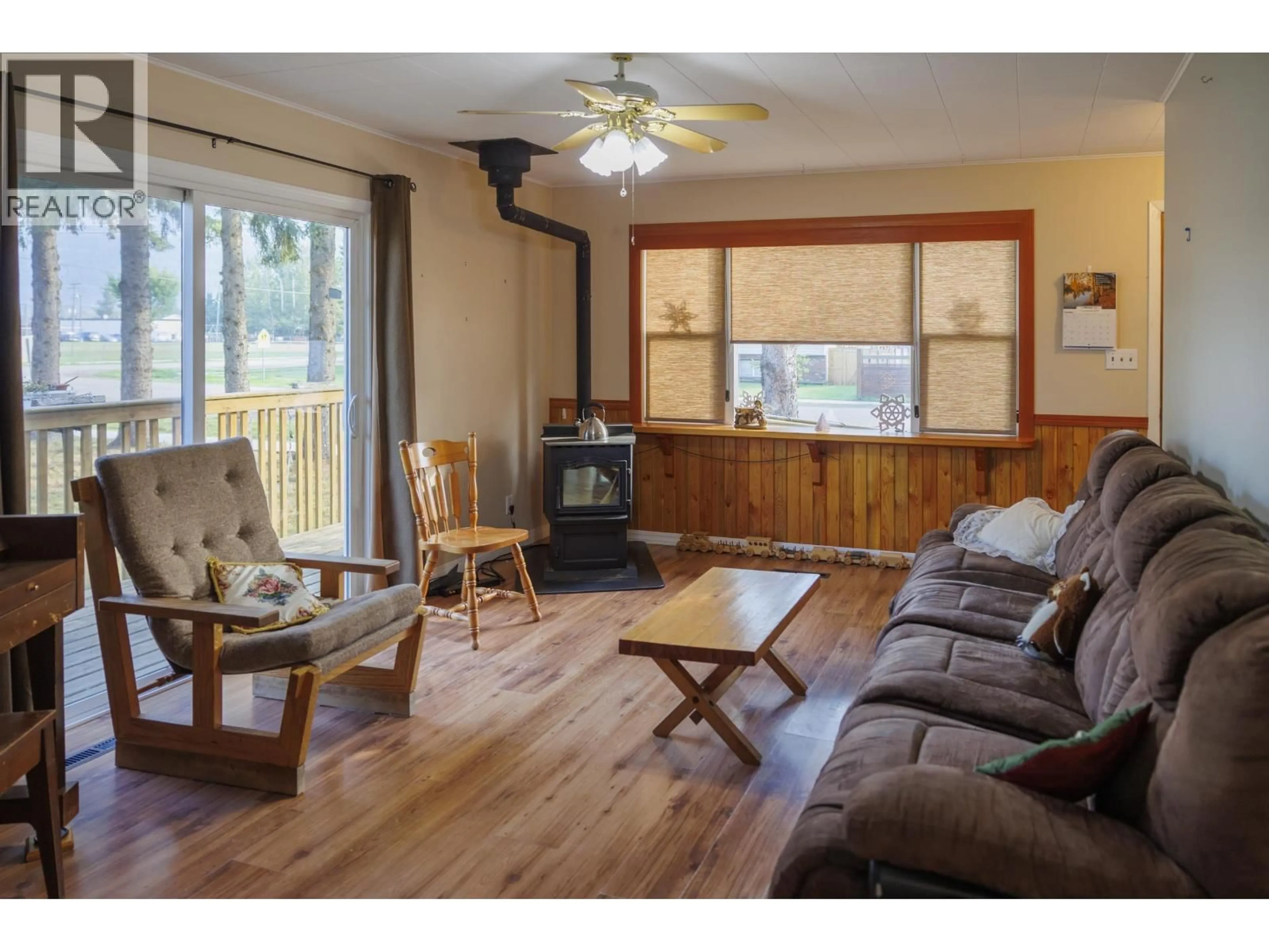 Living room with furniture, wood/laminate floor for 1155 3RD AVENUE, McBride British Columbia V0J2E0