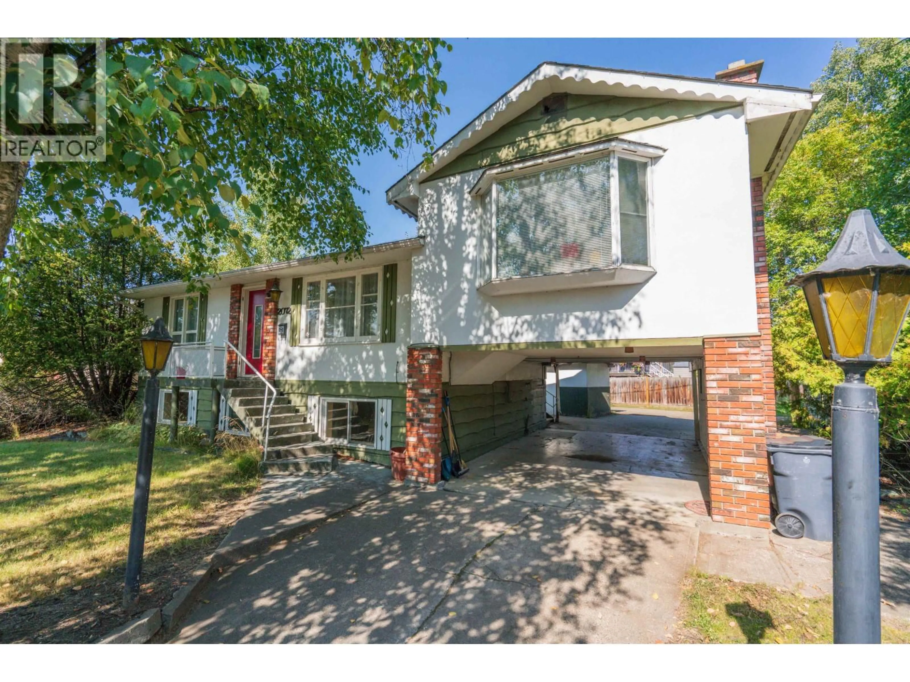 Home with brick exterior material, street for 2072 4TH AVENUE, Prince George British Columbia V2M1H9