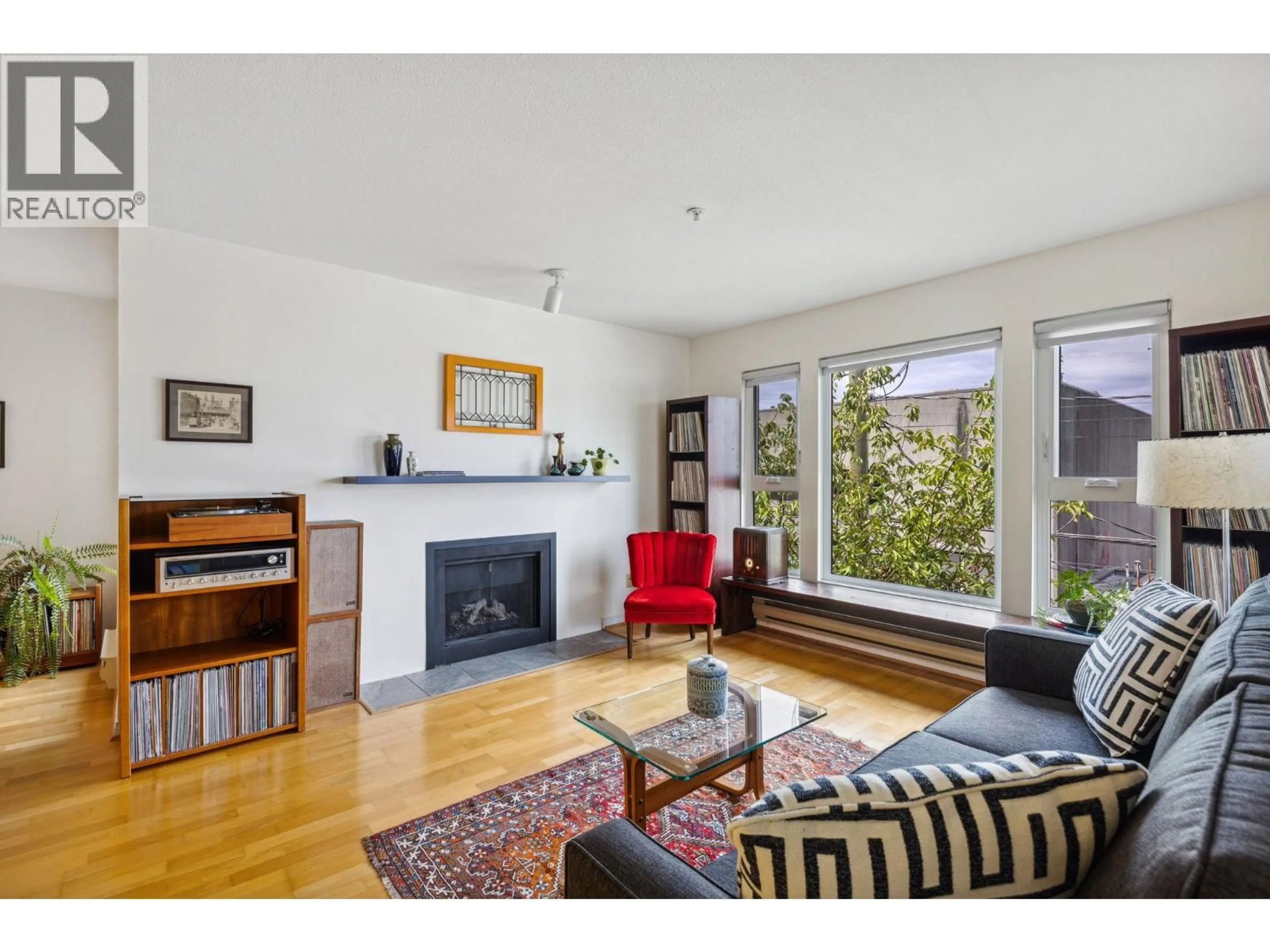Living room with furniture, wood/laminate floor for 304 - 2121 5TH AVENUE, Vancouver British Columbia V6K1S1