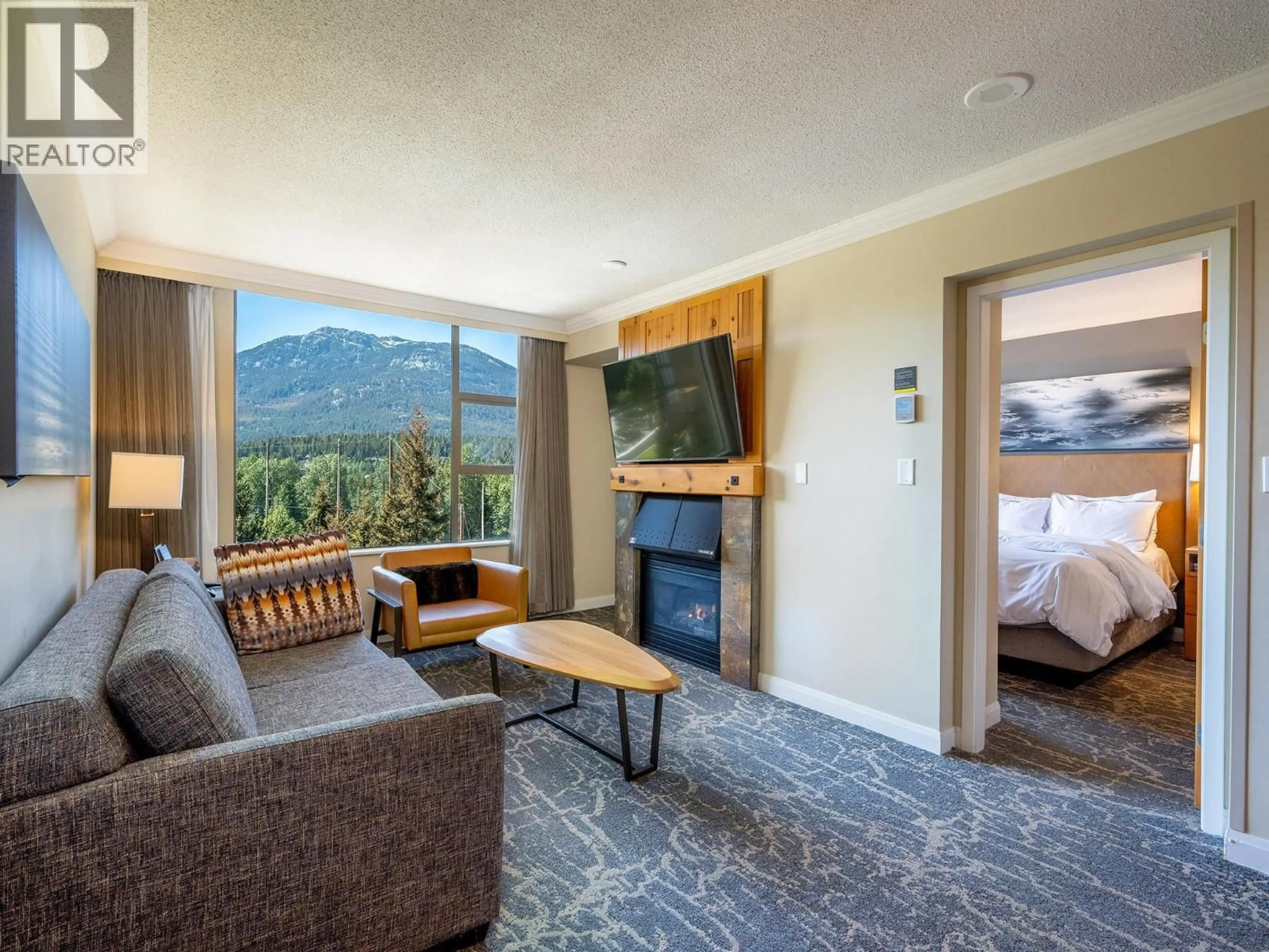 Living room with furniture, unknown for 661 - 4090 WHISTLER WAY, Whistler British Columbia V8E1J3