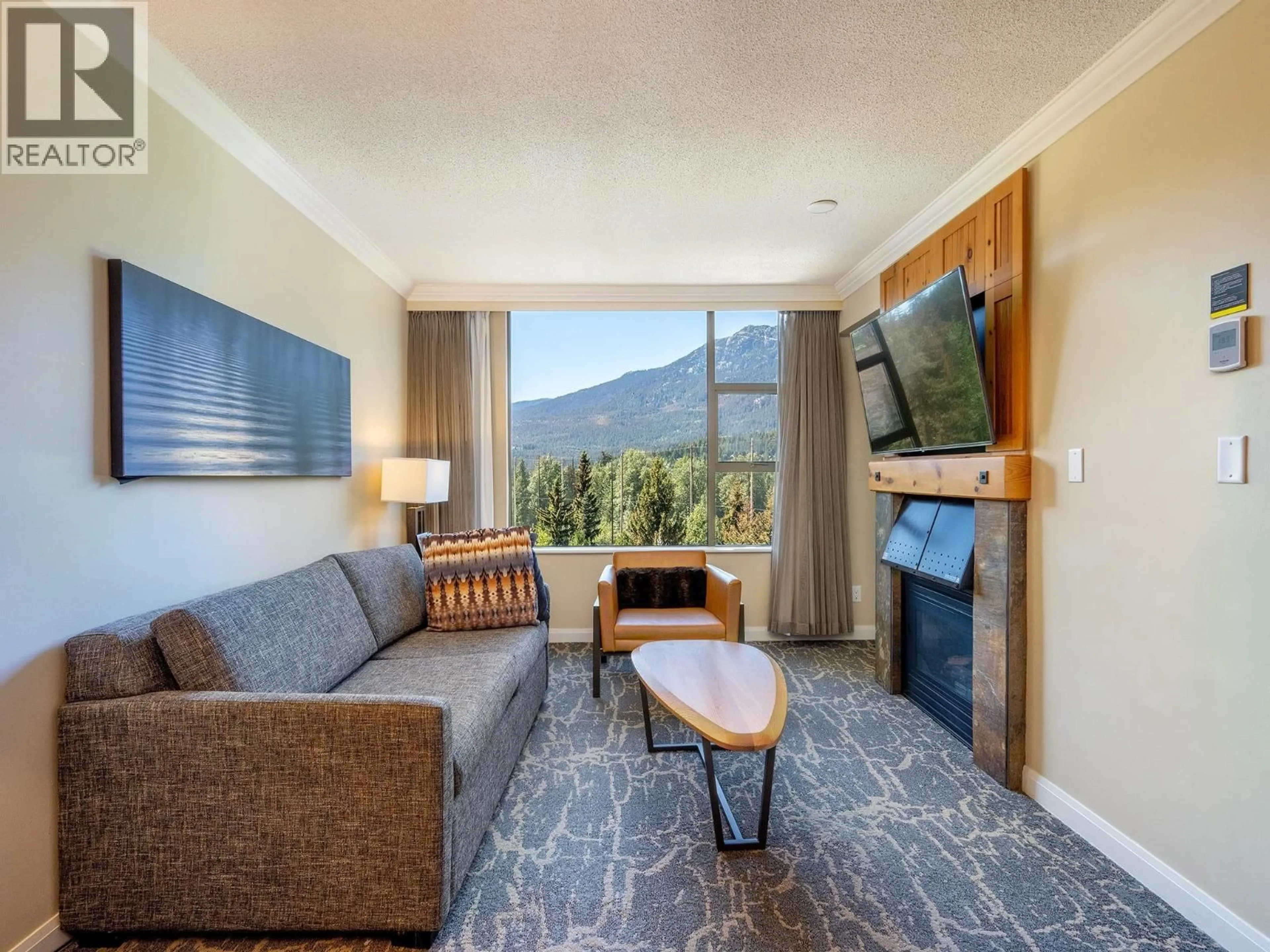 Living room with furniture, unknown for 661 - 4090 WHISTLER WAY, Whistler British Columbia V8E1J3