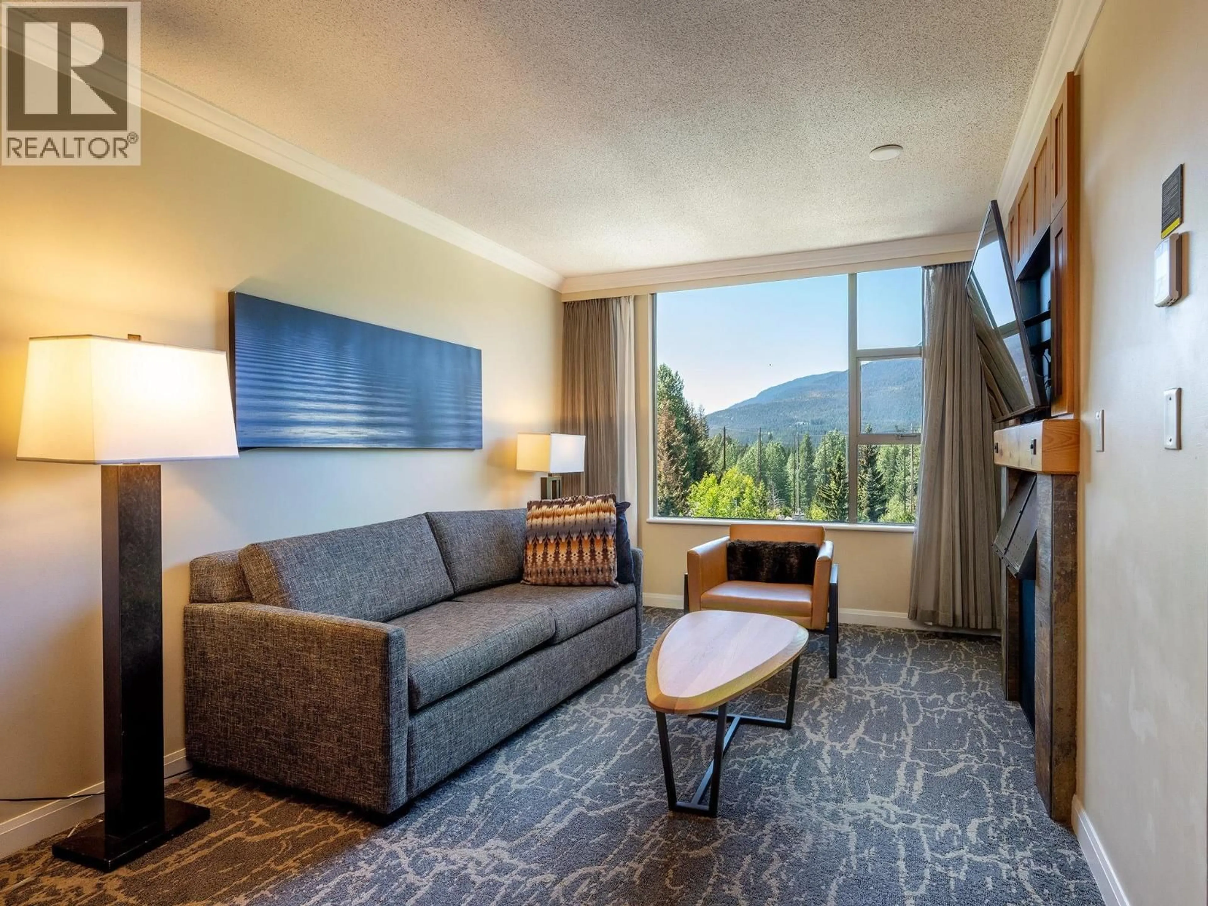 Living room with furniture, unknown for 661 - 4090 WHISTLER WAY, Whistler British Columbia V8E1J3