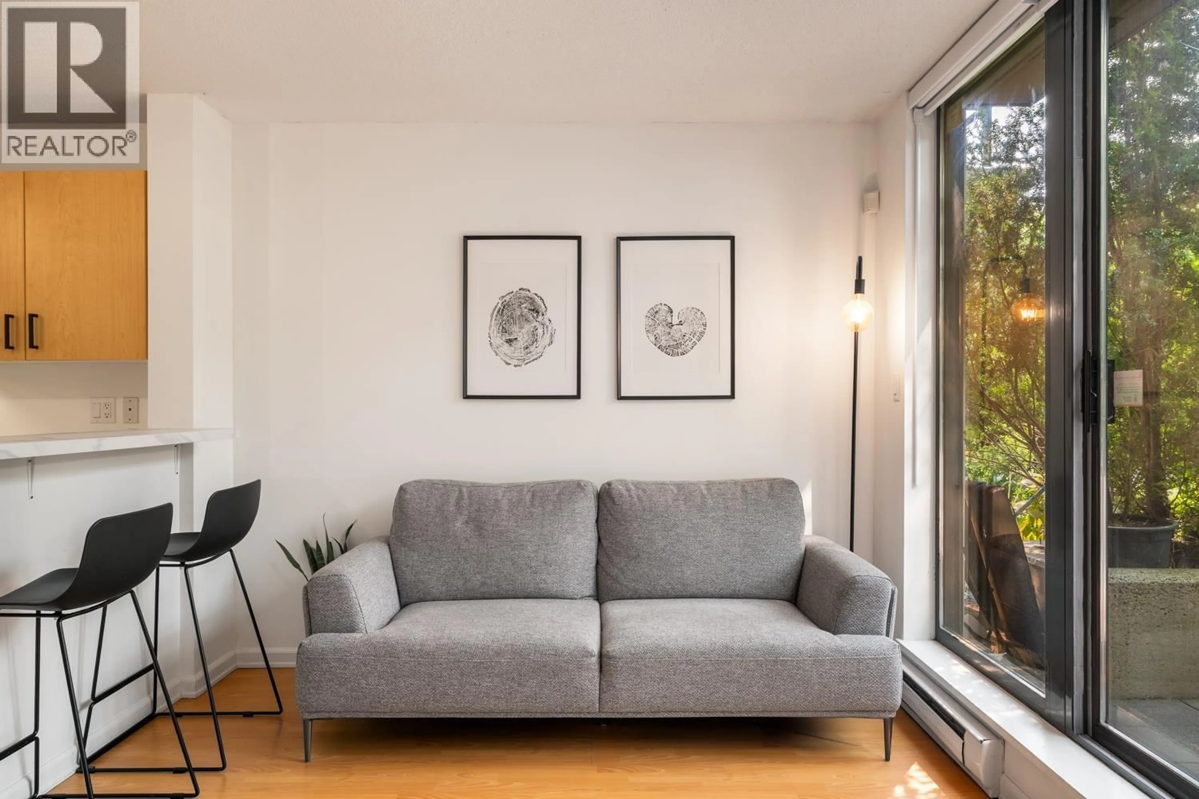 Living room with furniture, unknown for 115 - 3520 CROWLEY DRIVE, Vancouver British Columbia V5R6G9