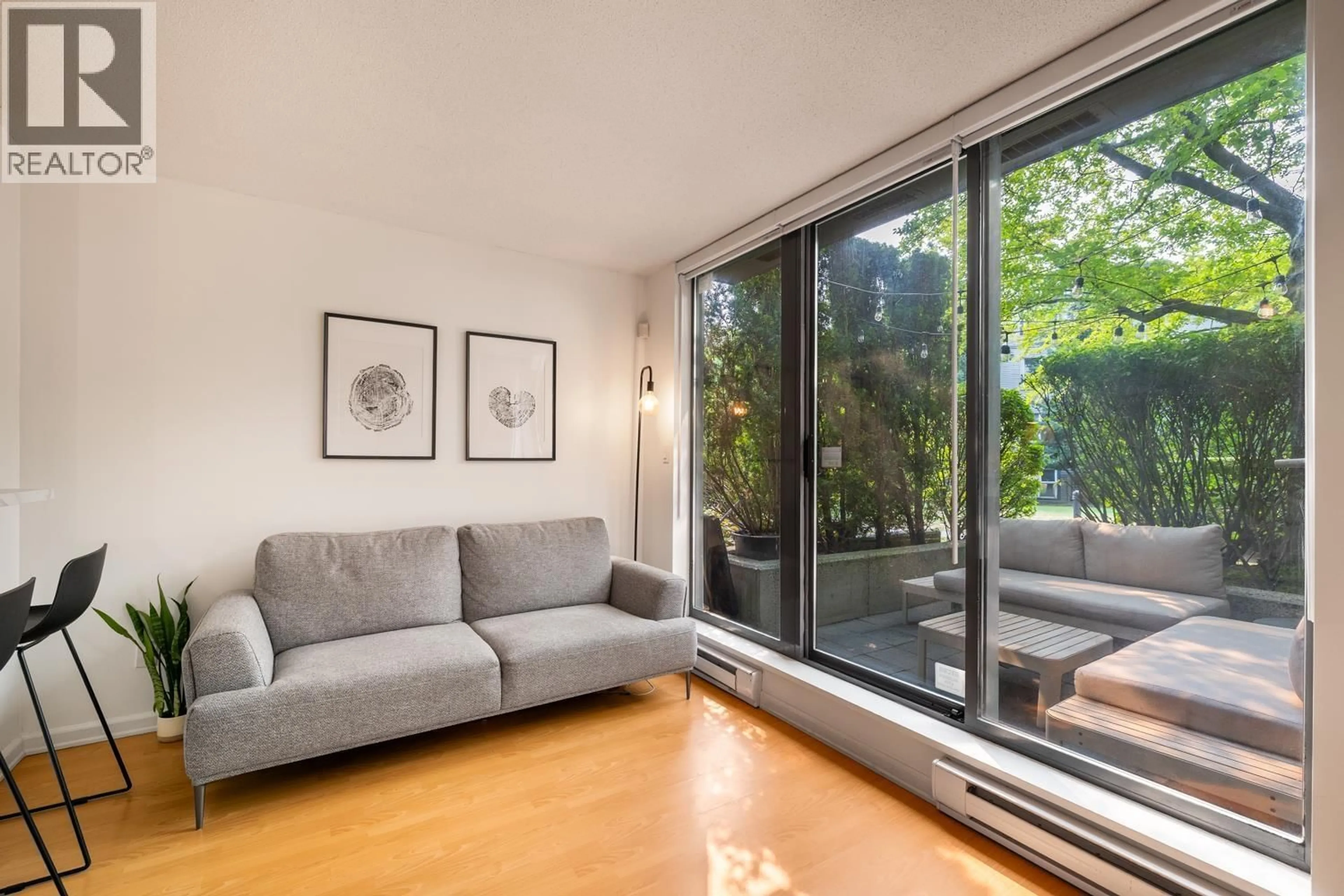 Living room with furniture, unknown for 115 - 3520 CROWLEY DRIVE, Vancouver British Columbia V5R6G9