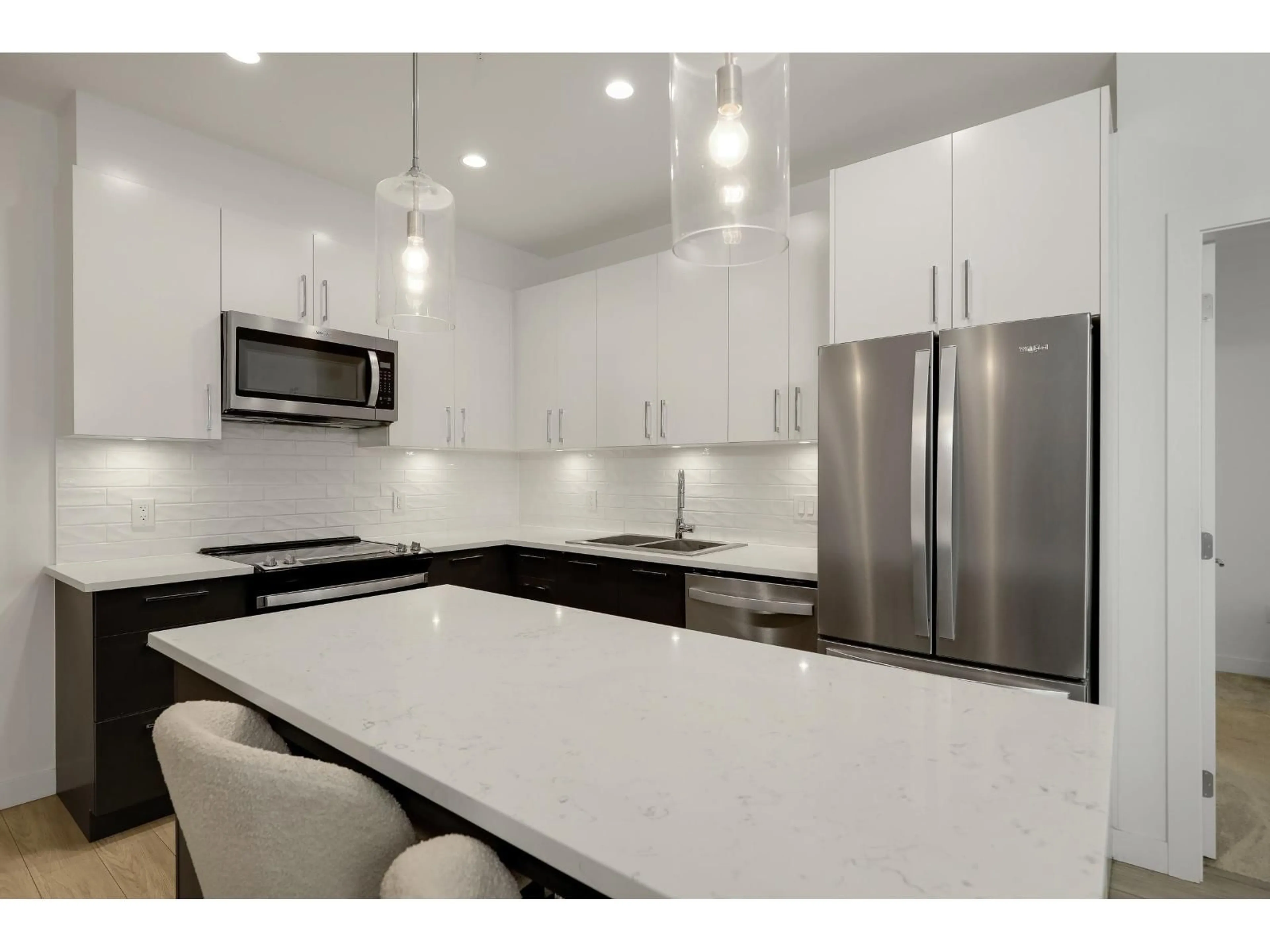 Open concept kitchen, ceramic/tile floor for A204 - 20834 80, Langley British Columbia V2Y2C8