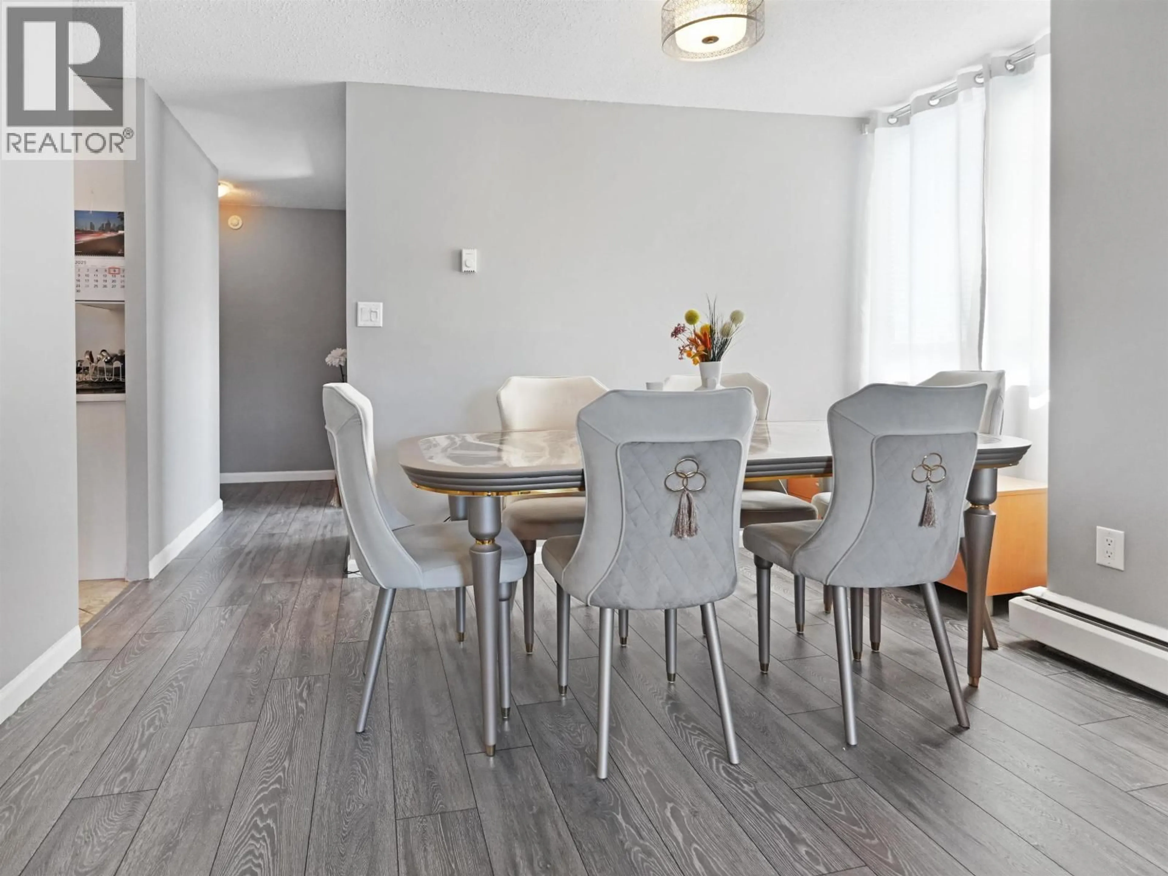 Dining room, wood/laminate floor for 1605 - 3737 BARTLETT COURT, Burnaby British Columbia V3J7E3