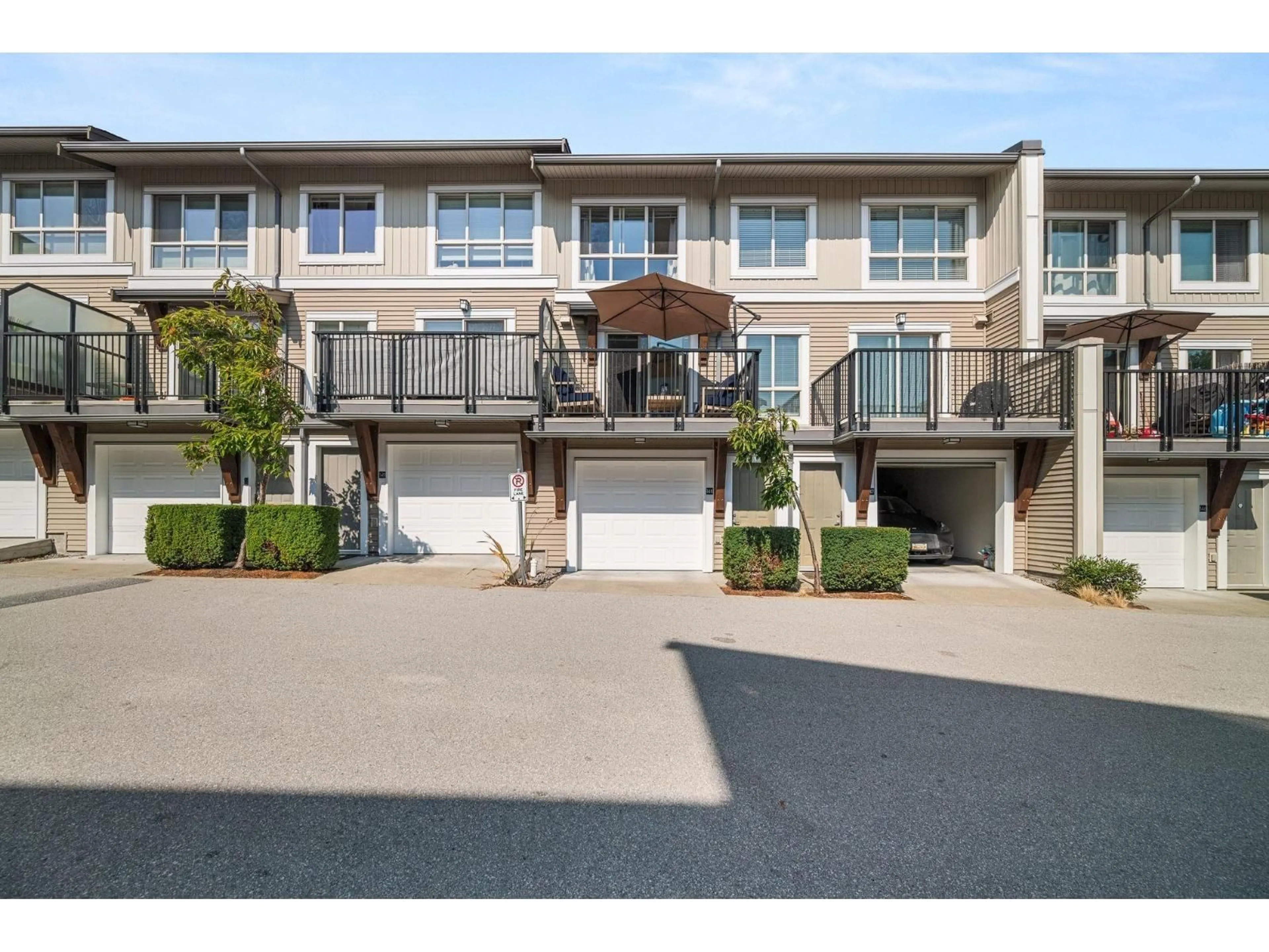 A pic from outside/outdoor area/front of a property/back of a property/a pic from drone, street for 148 - 6671 121, Surrey British Columbia V3W1T9
