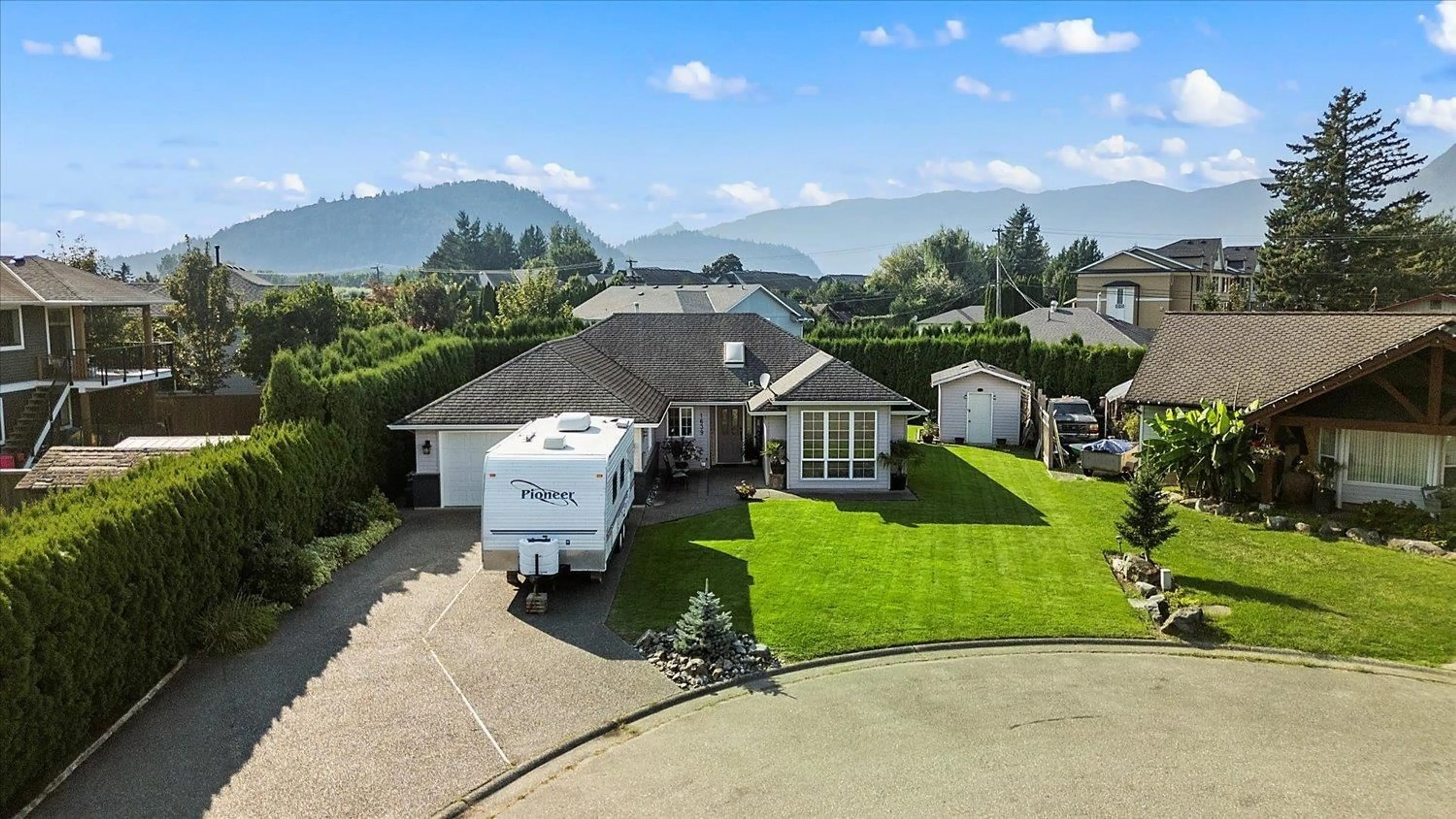 A pic from outside/outdoor area/front of a property/back of a property/a pic from drone, mountain view for 1639 CANTERBURY DRIVE, Agassiz British Columbia V0M1A3