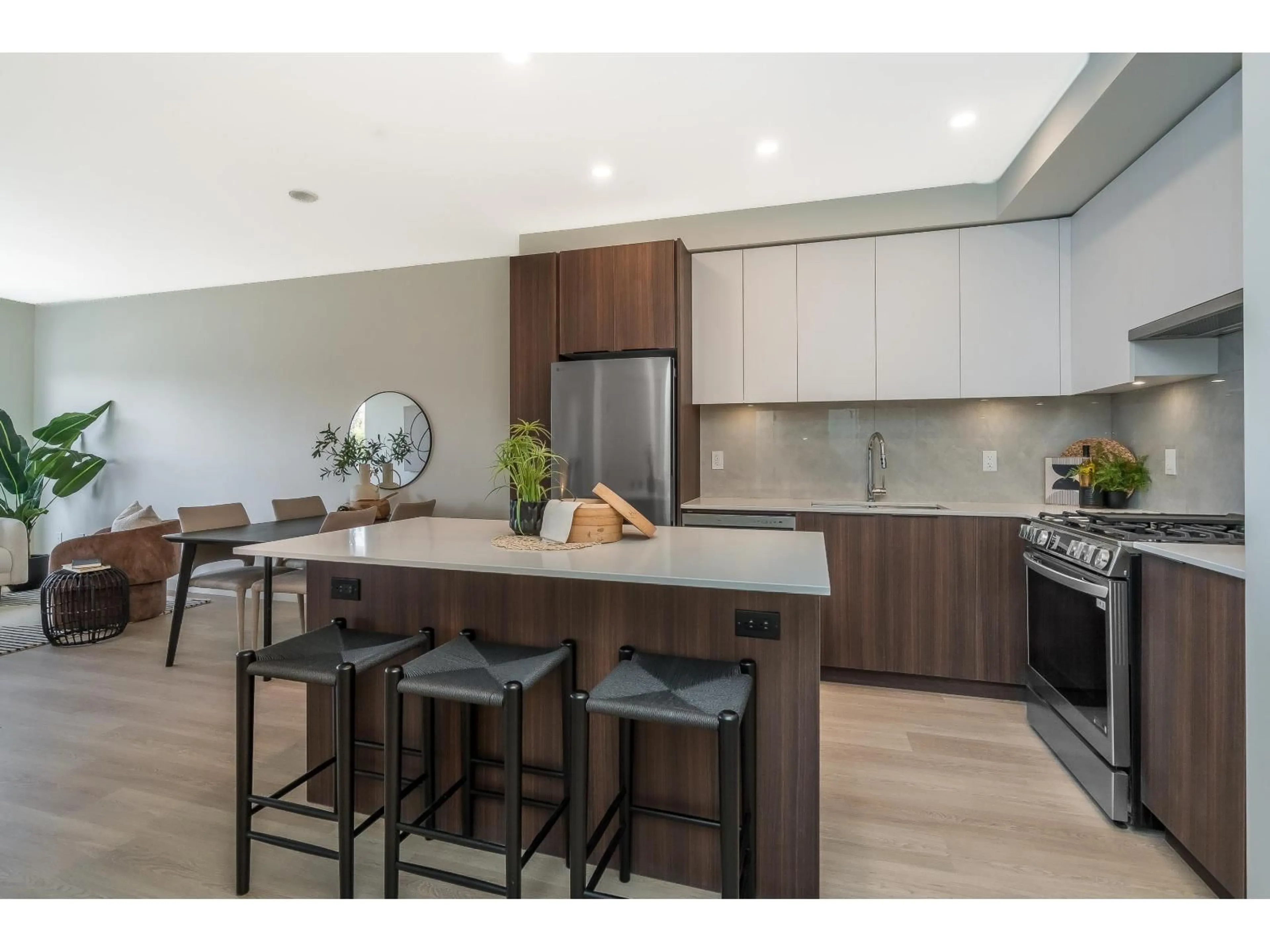 Open concept kitchen, wood/laminate floor for 403 - 7980 206A, Langley British Columbia V2Y3Z8