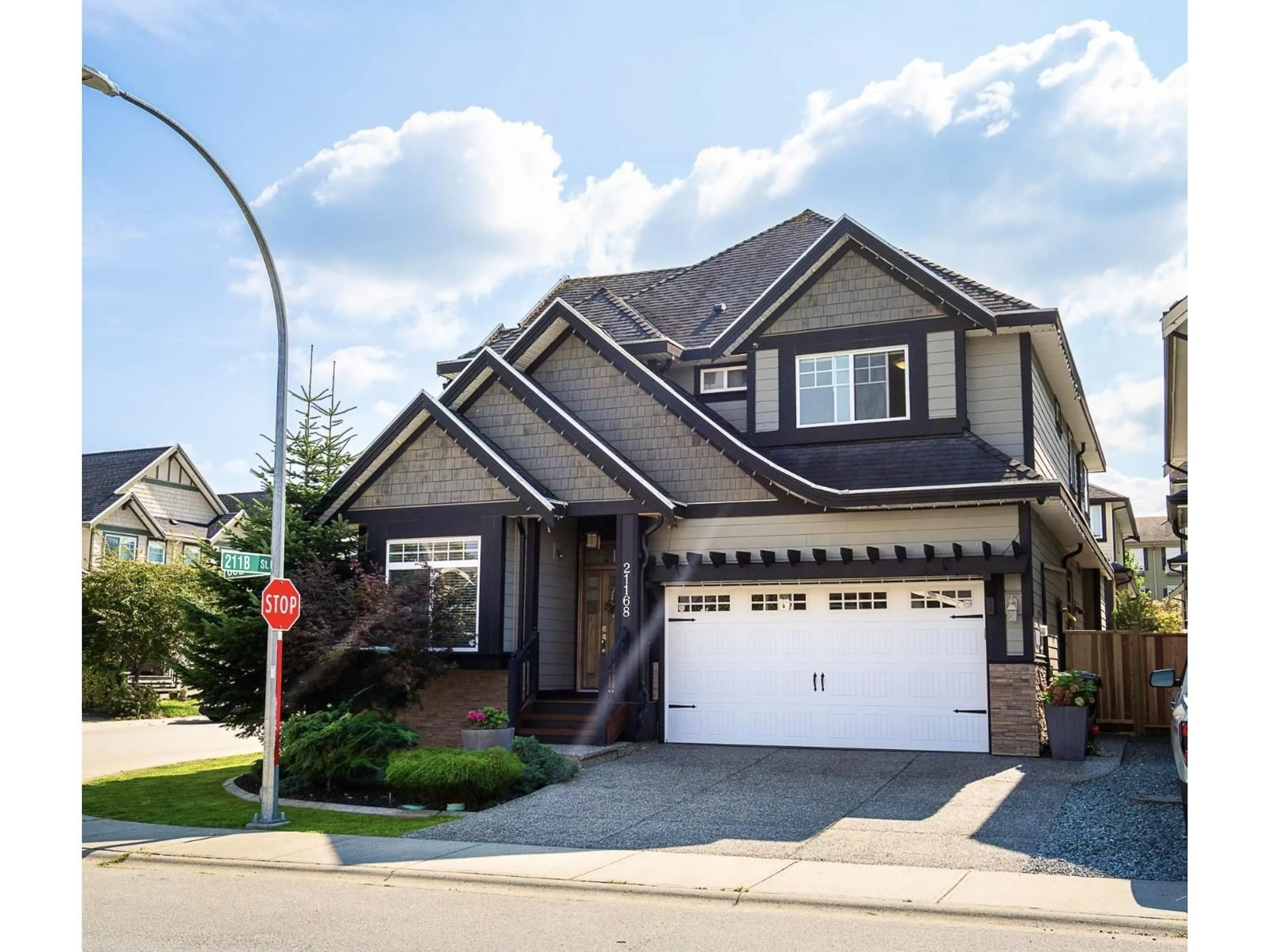 Home with vinyl exterior material, street for 21168 80B, Langley British Columbia V2Y0K3
