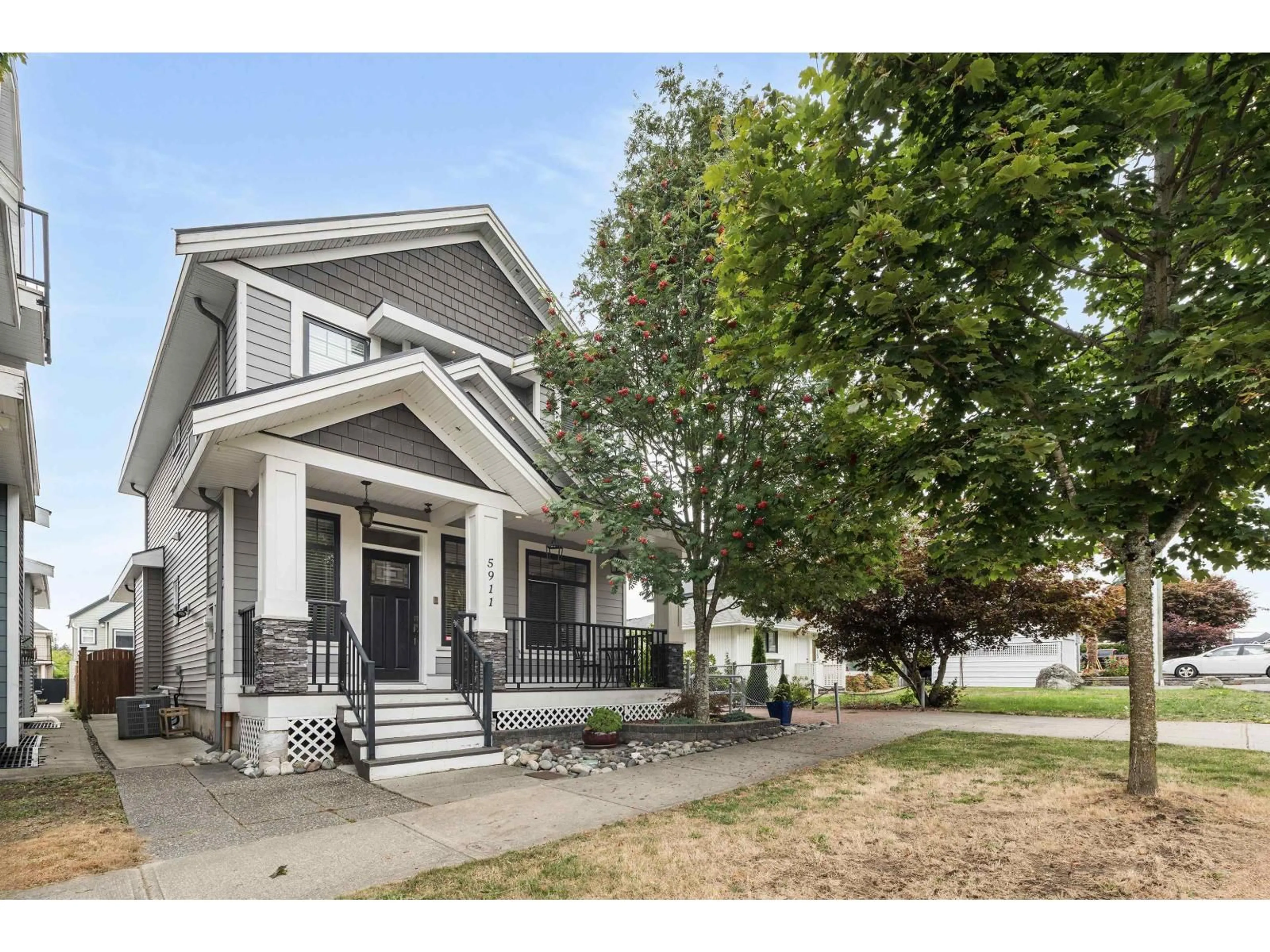 Home with vinyl exterior material, street for 5911 131A, Surrey British Columbia V3X0E4