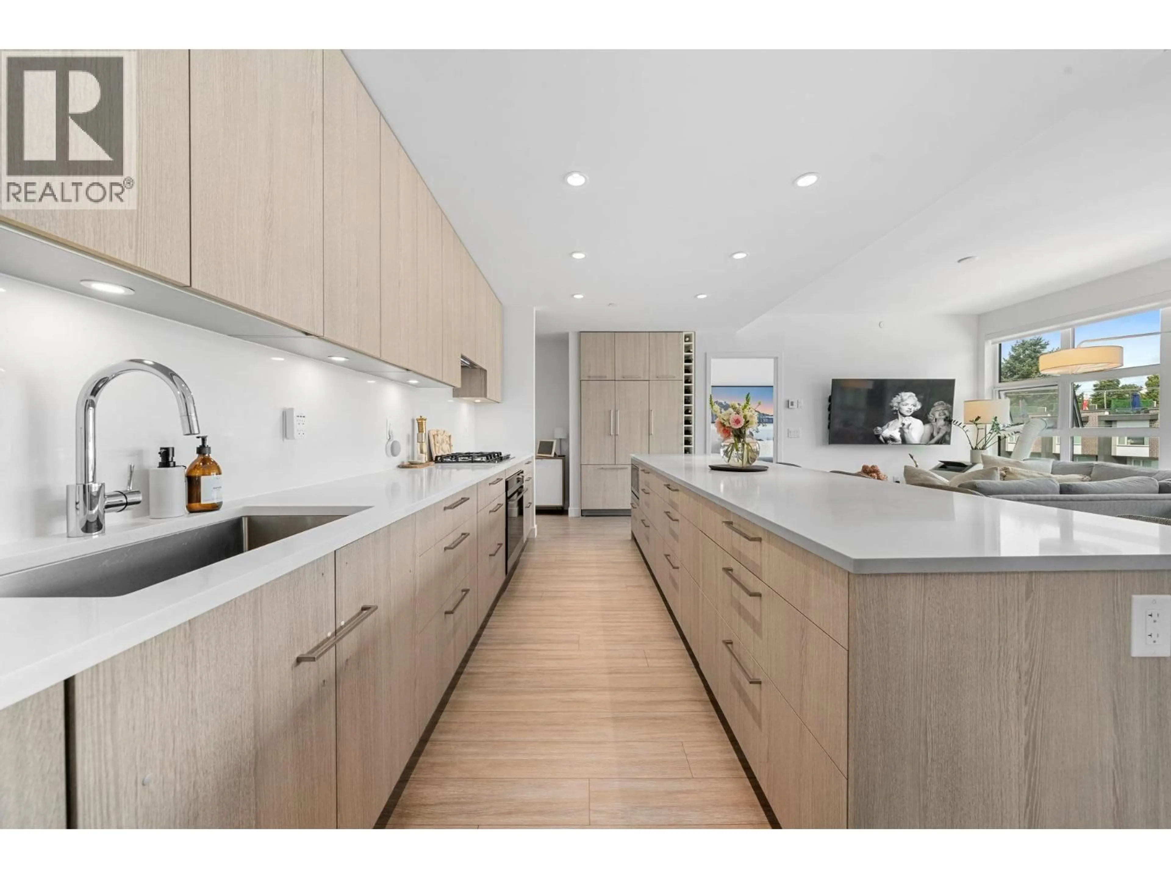 Open concept kitchen, unknown for 413 - 747 3RD STREET, North Vancouver British Columbia V7L1G8