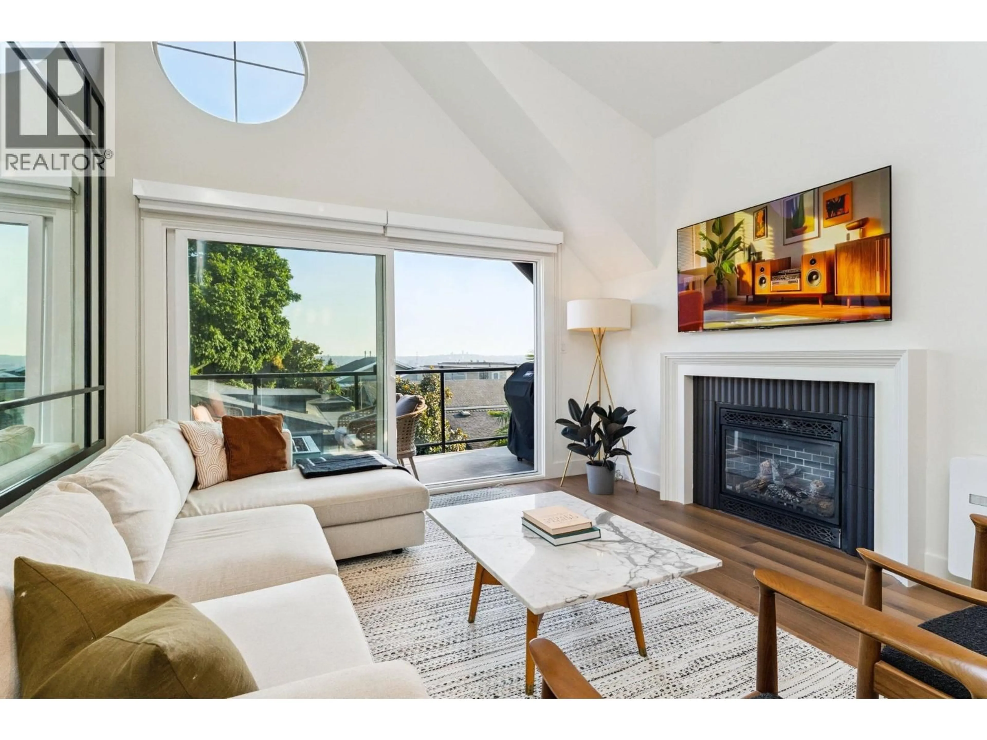Living room with furniture, wood/laminate floor for 331 8TH STREET, North Vancouver British Columbia V7L1Z2
