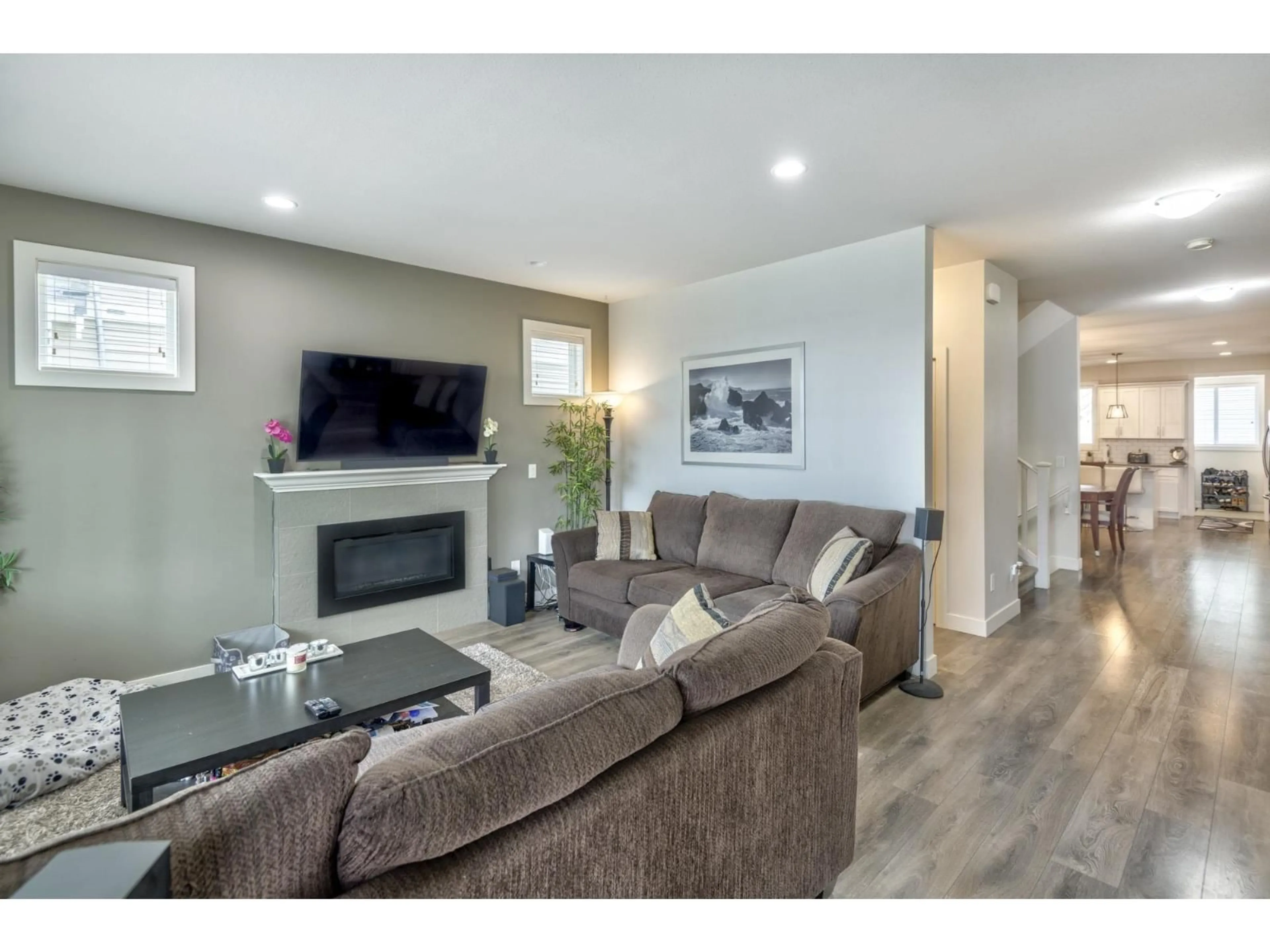Living room with furniture, wood/laminate floor for 32865 3RD, Mission British Columbia V2V1M9