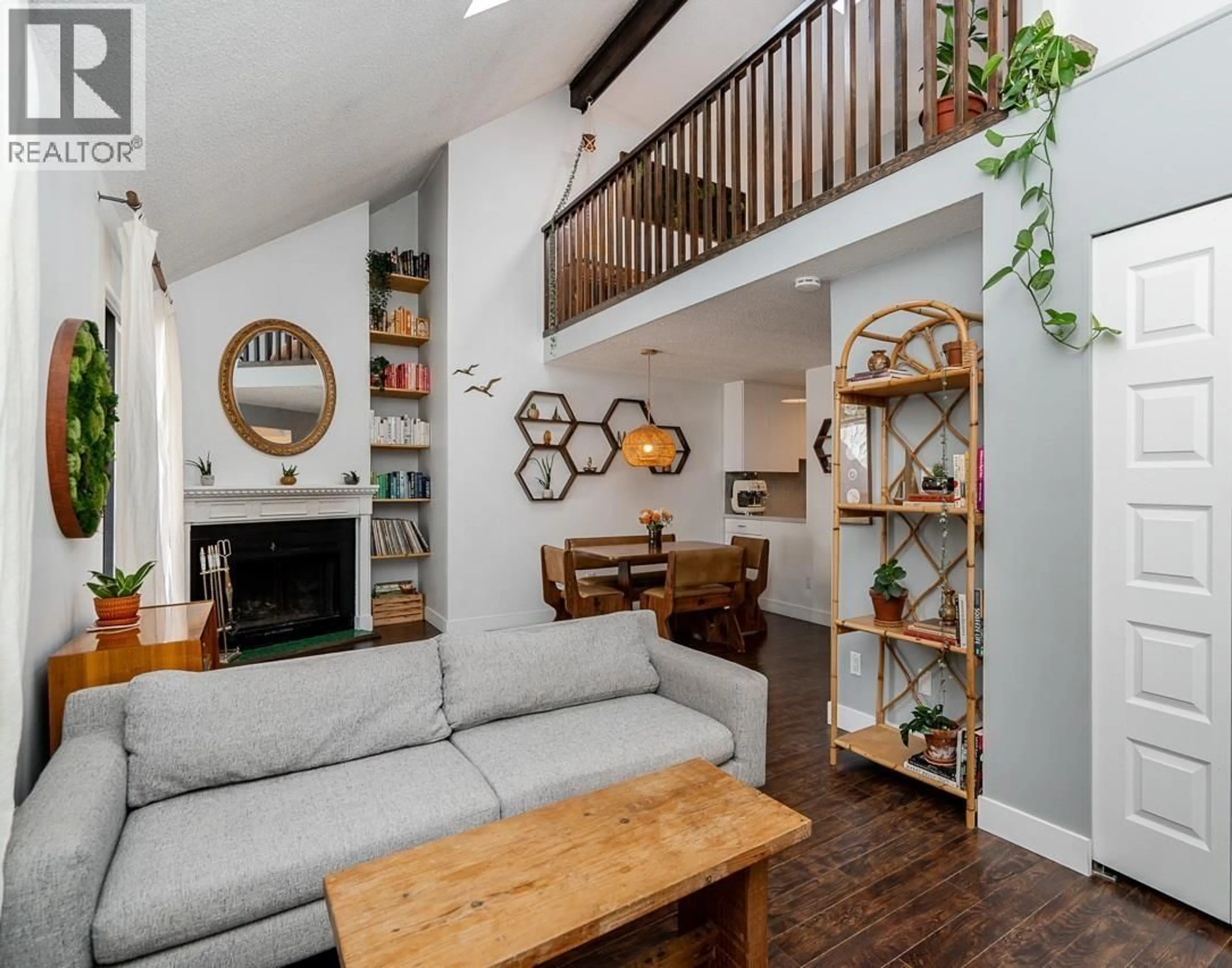 Living room with furniture, wood/laminate floor for PH3 - 936 BUTE STREET, Vancouver British Columbia V6E1Y8