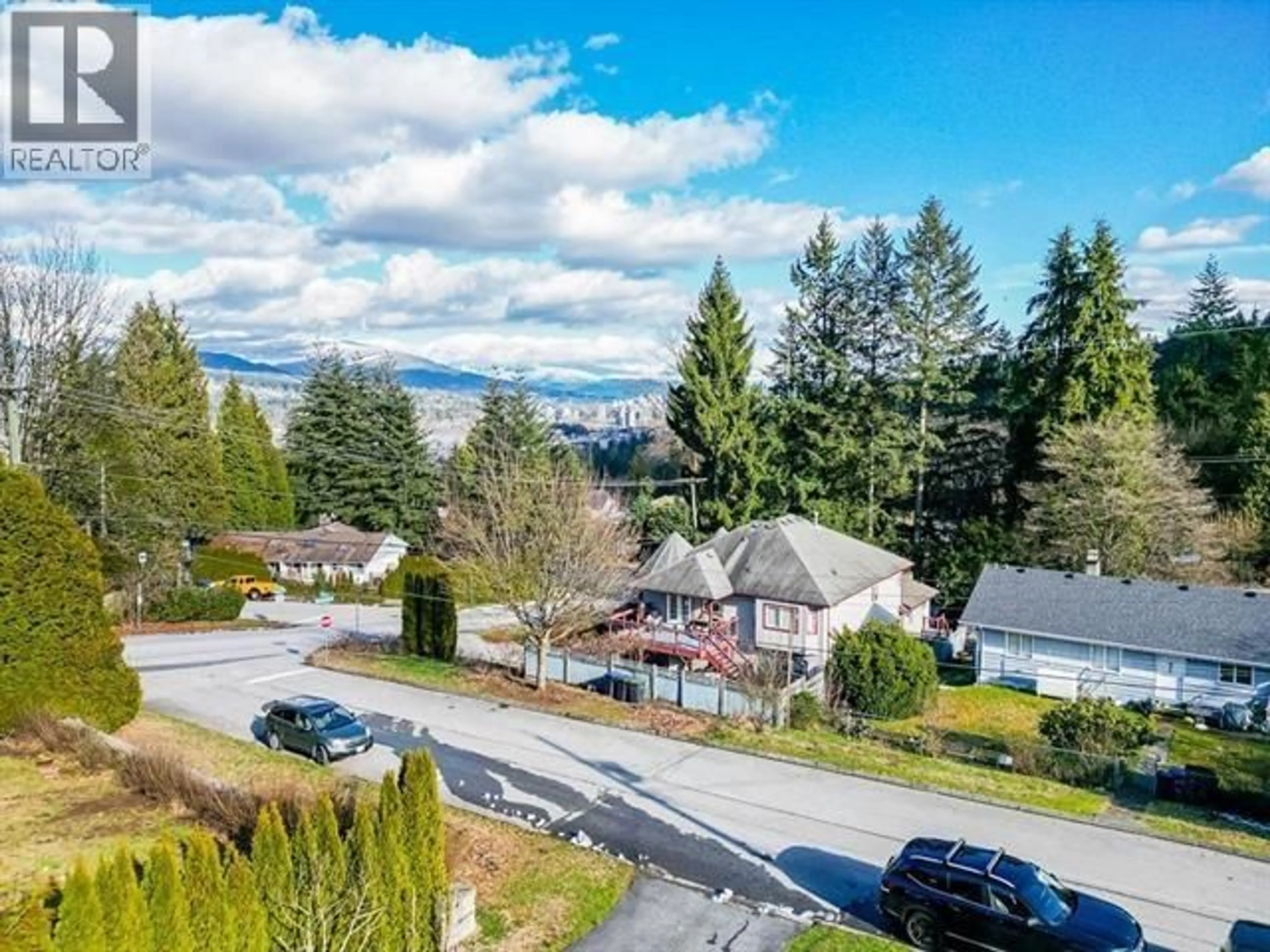A pic from outside/outdoor area/front of a property/back of a property/a pic from drone, mountain view for 941 TUXEDO DRIVE, Port Moody British Columbia V3H1L2