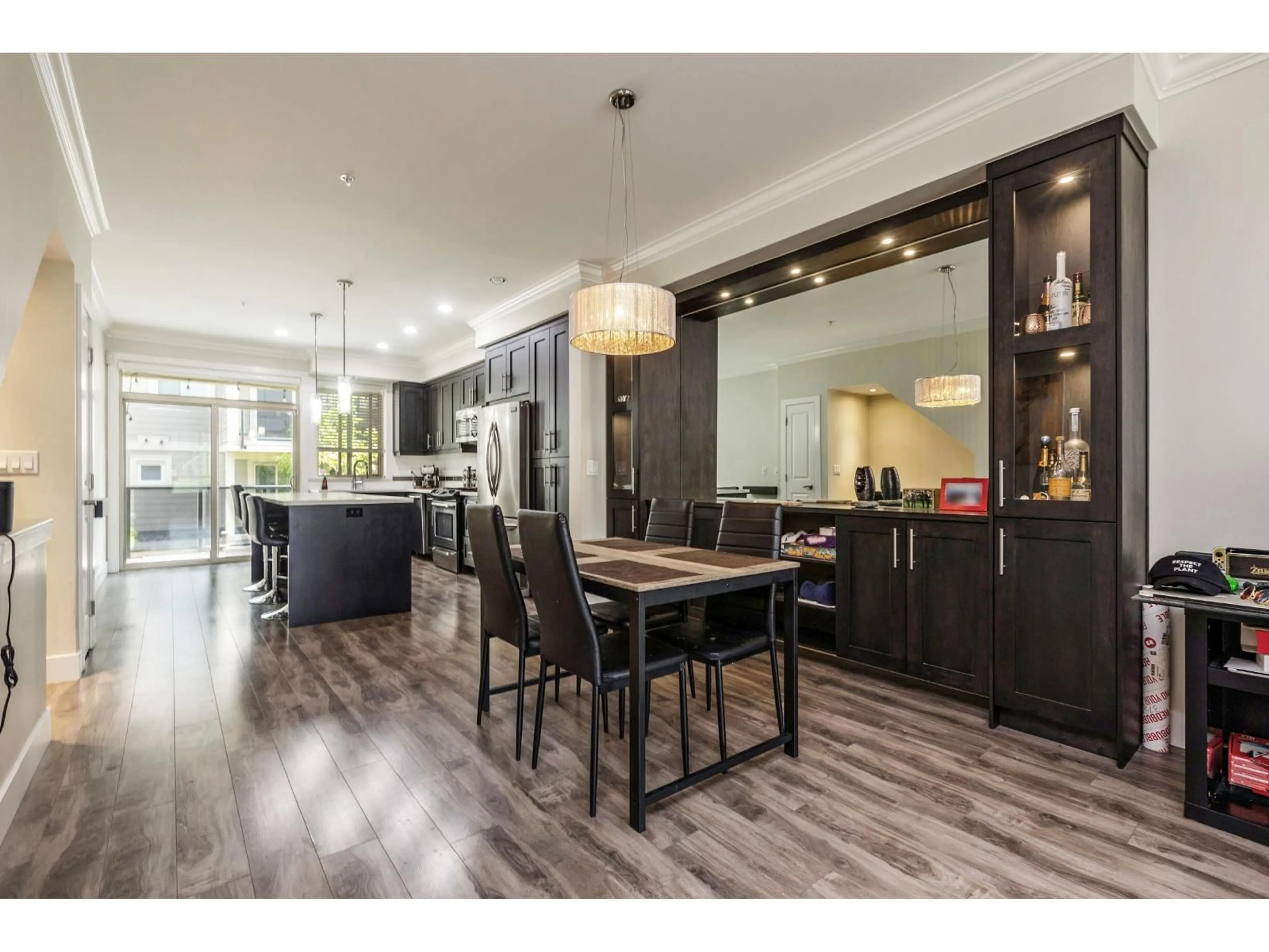 Open concept kitchen, wood/laminate floor for 10 - 19913 70, Langley British Columbia V2Y0S9