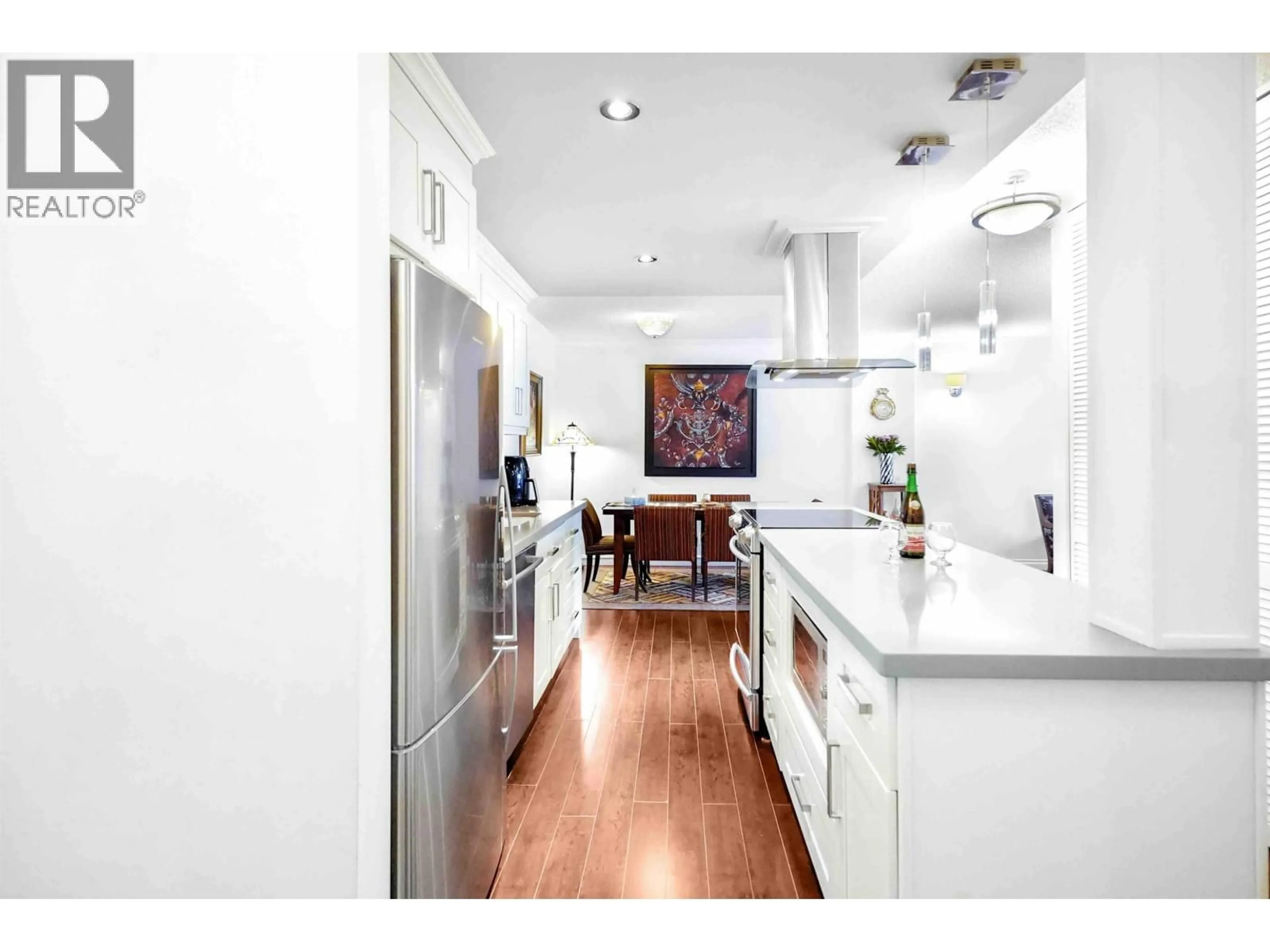 Contemporary kitchen, wood/laminate floor for 306 - 2020 FULLERTON AVENUE, North Vancouver British Columbia V7P3G3