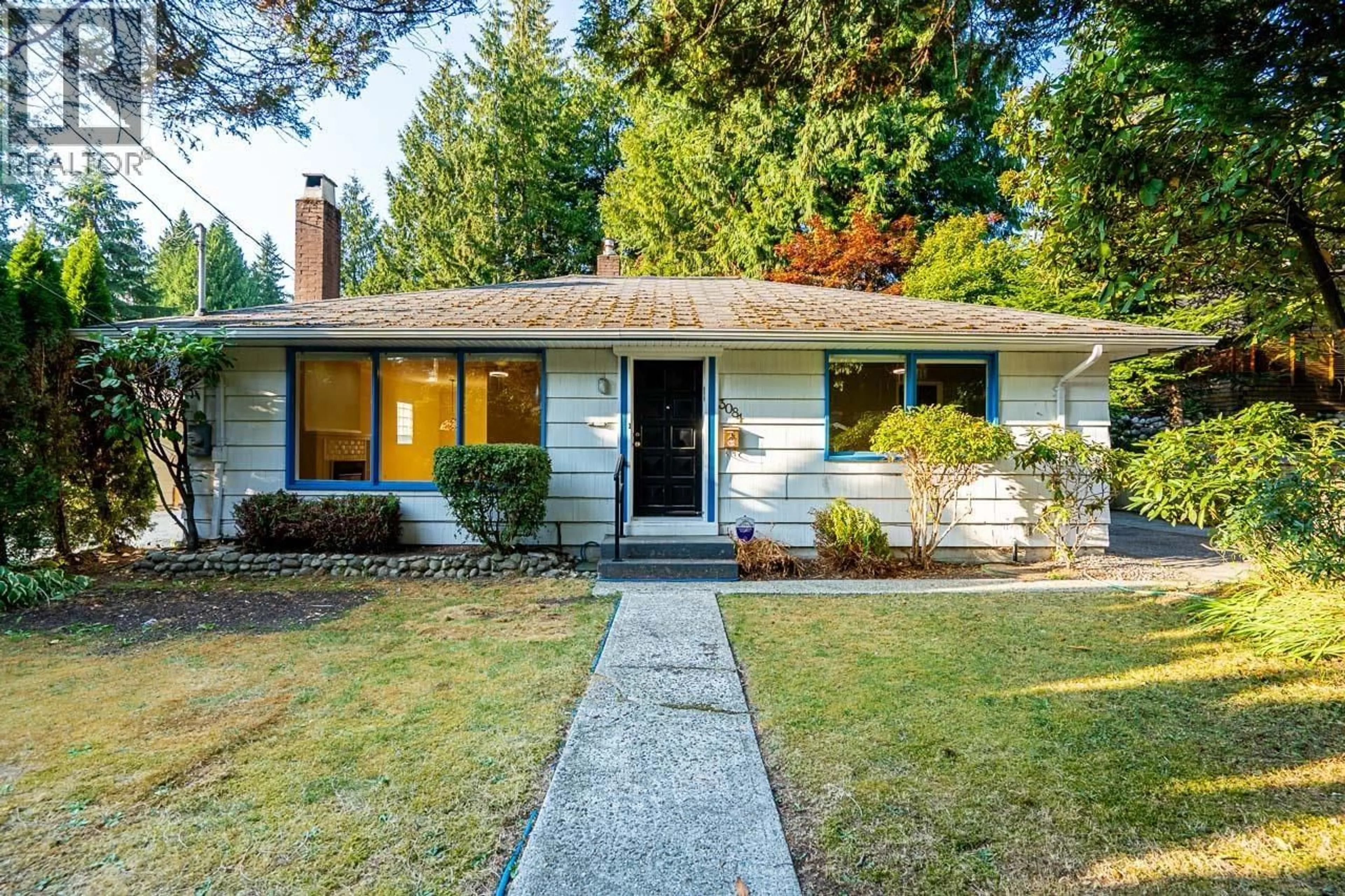 Home with vinyl exterior material, street for 3084 PAISLEY ROAD, North Vancouver British Columbia V7R1C8