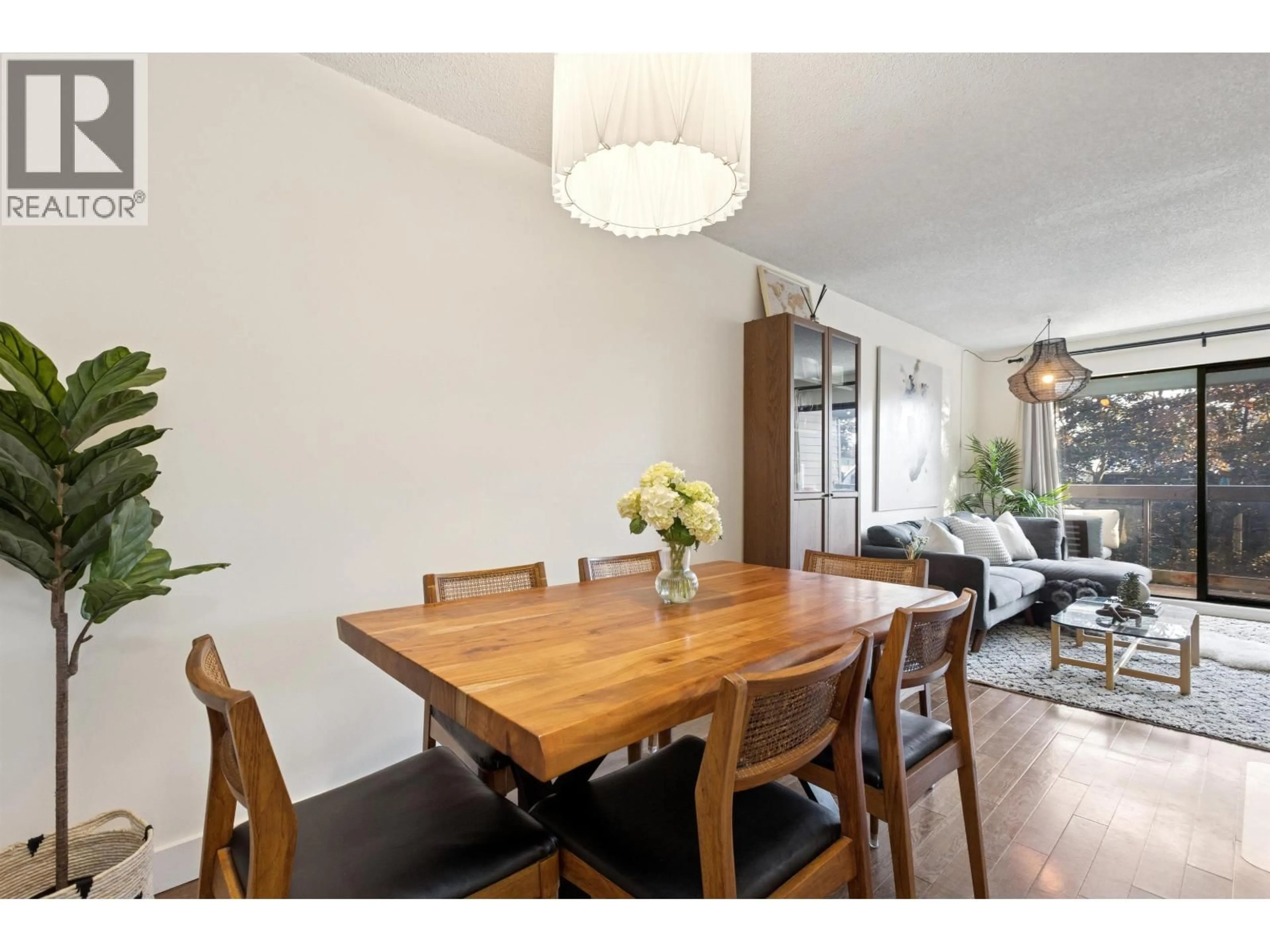 Dining room, wood/laminate floor for 319 - 1422 3RD AVENUE, Vancouver British Columbia V5N5R5