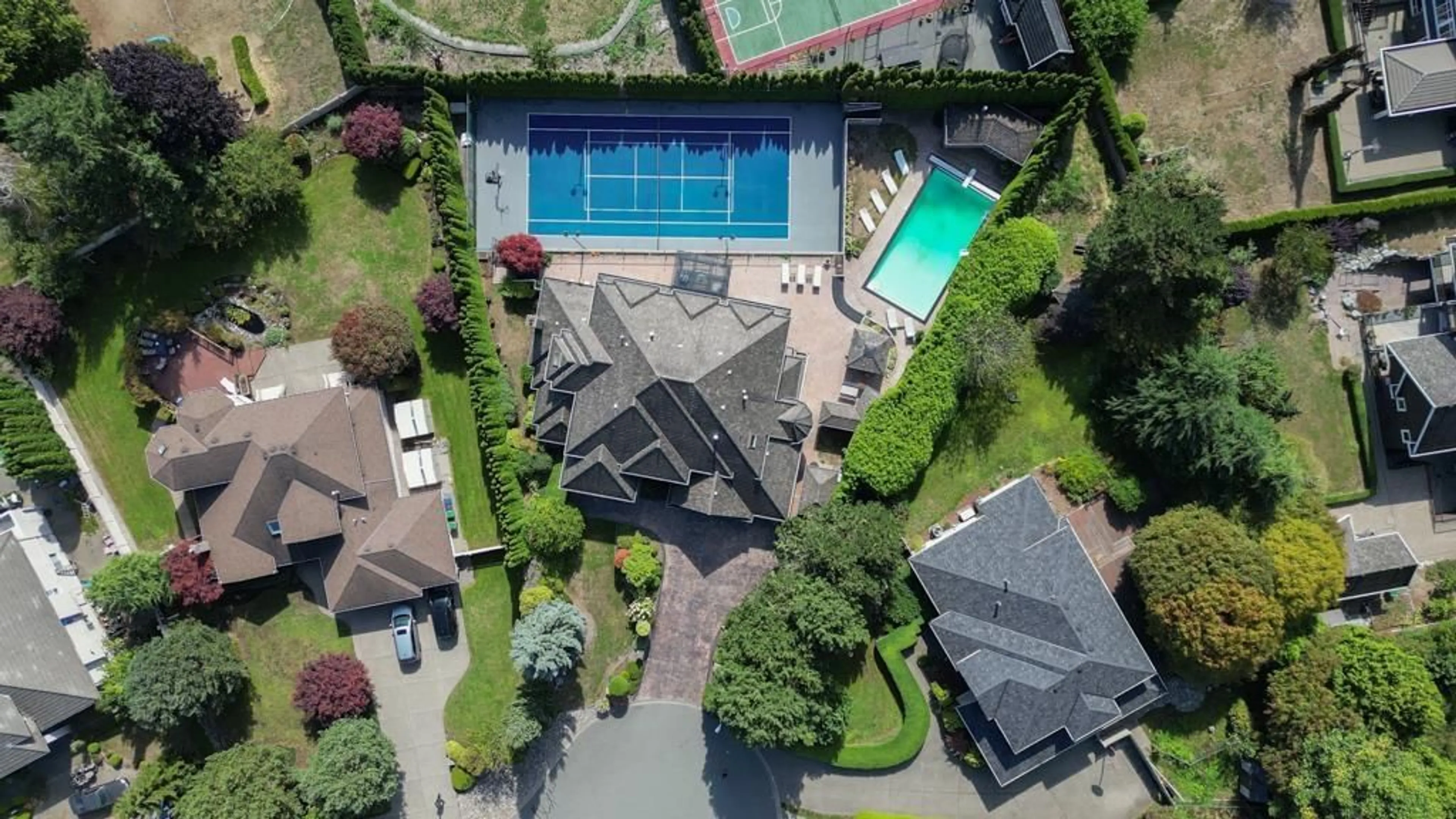 A pic from outside/outdoor area/front of a property/back of a property/a pic from drone, street for 12256 57, Surrey British Columbia V3X3H7