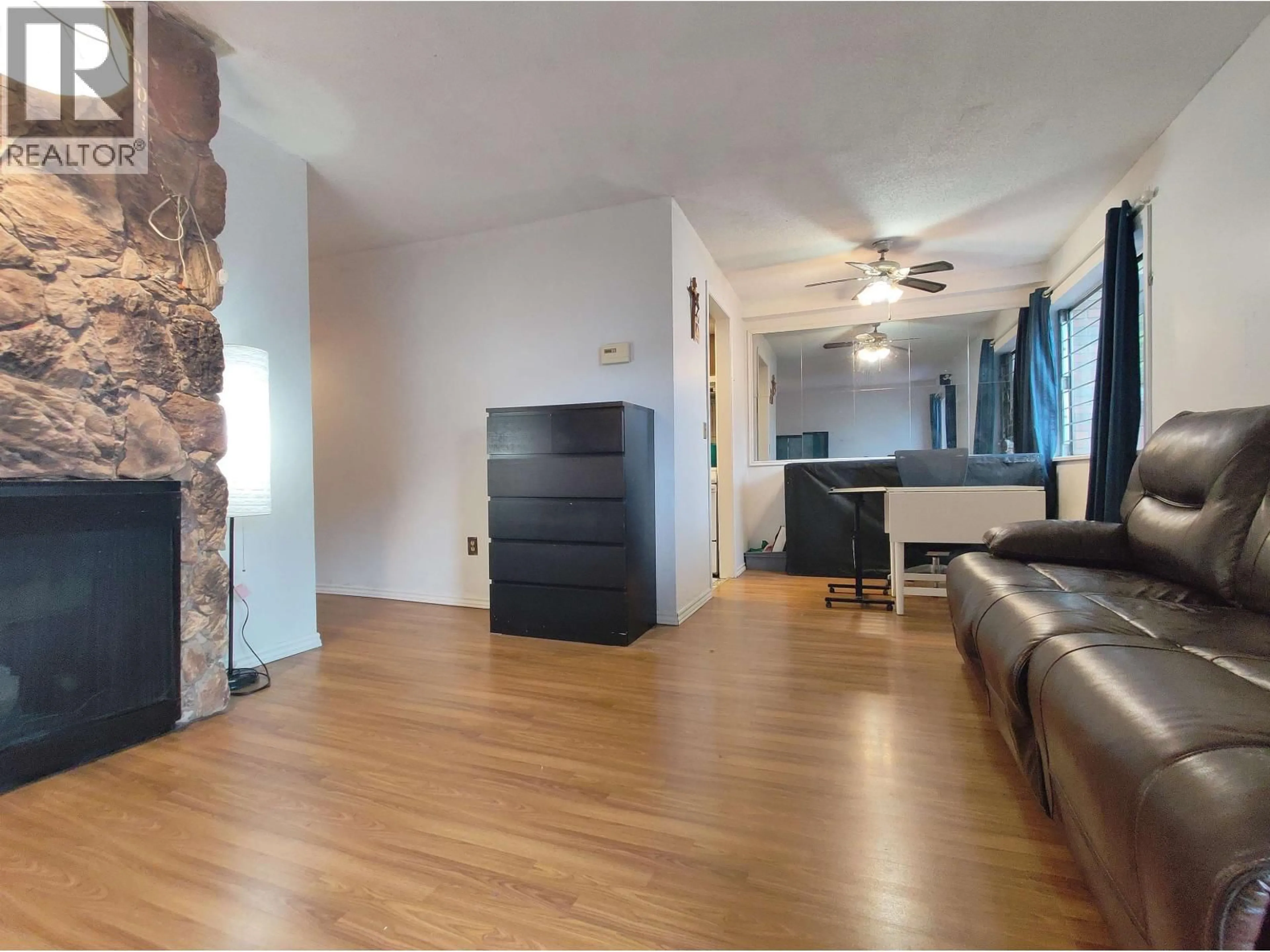 Living room with furniture, wood/laminate floor for 108 - 1420 7TH AVENUE, Vancouver British Columbia V5N1R8