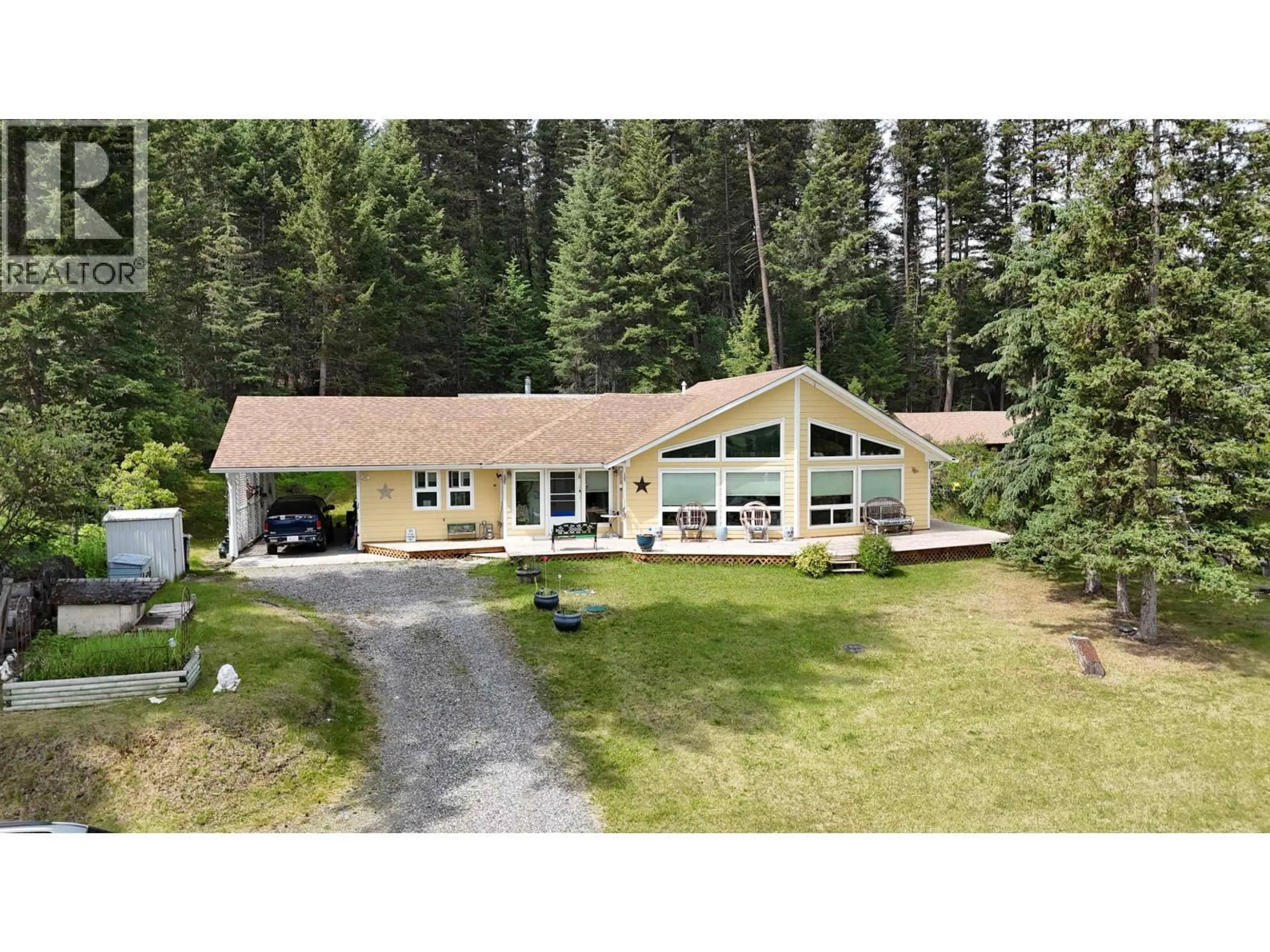 A pic from outside/outdoor area/front of a property/back of a property/a pic from drone, unknown for 5328 KALLUM DRIVE, 108 Mile Ranch British Columbia V0K2Z0