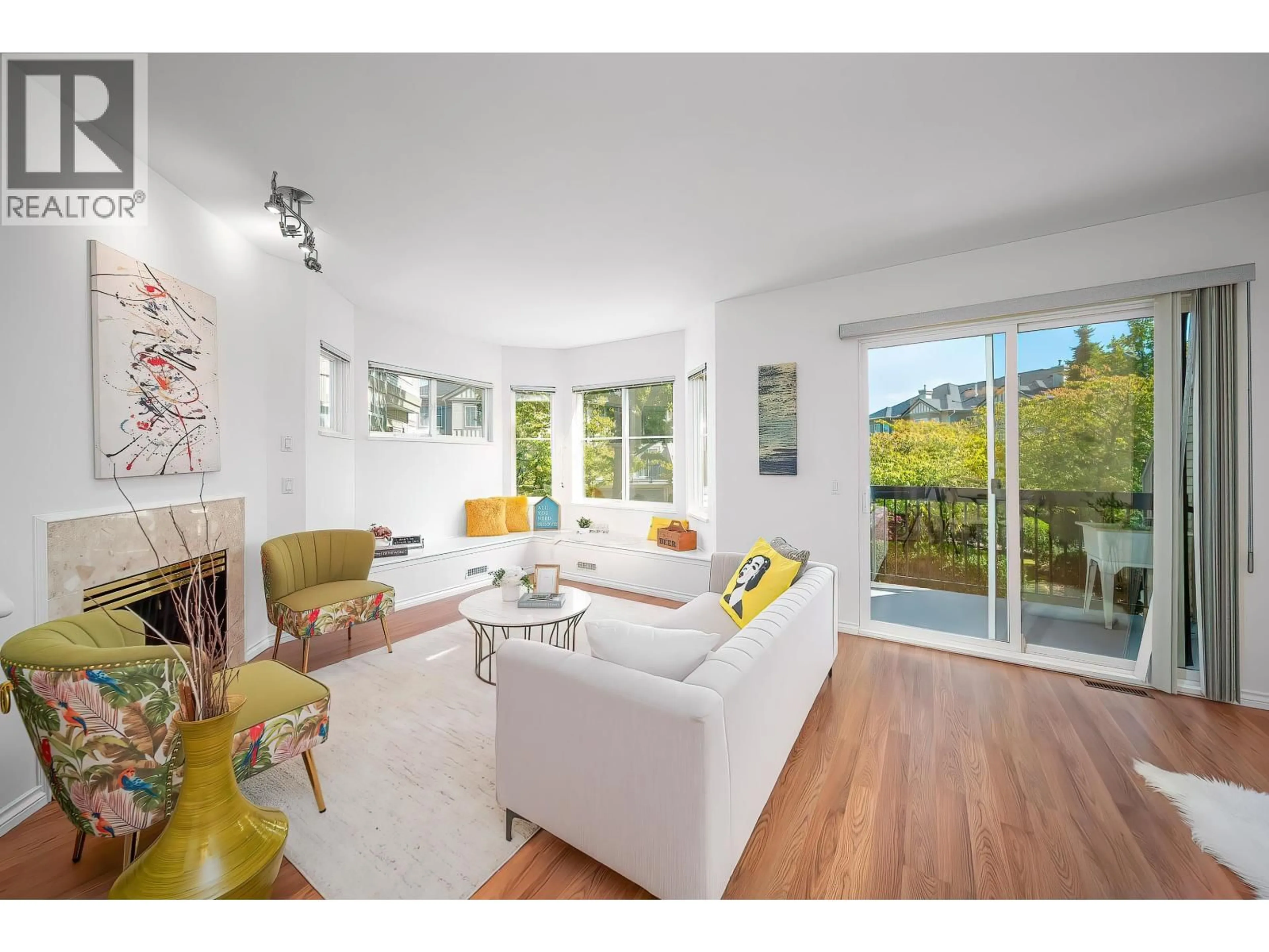 Living room with furniture, wood/laminate floor for 129 - 3880 WESTMINSTER HIGHWAY, Richmond British Columbia V7C5S1