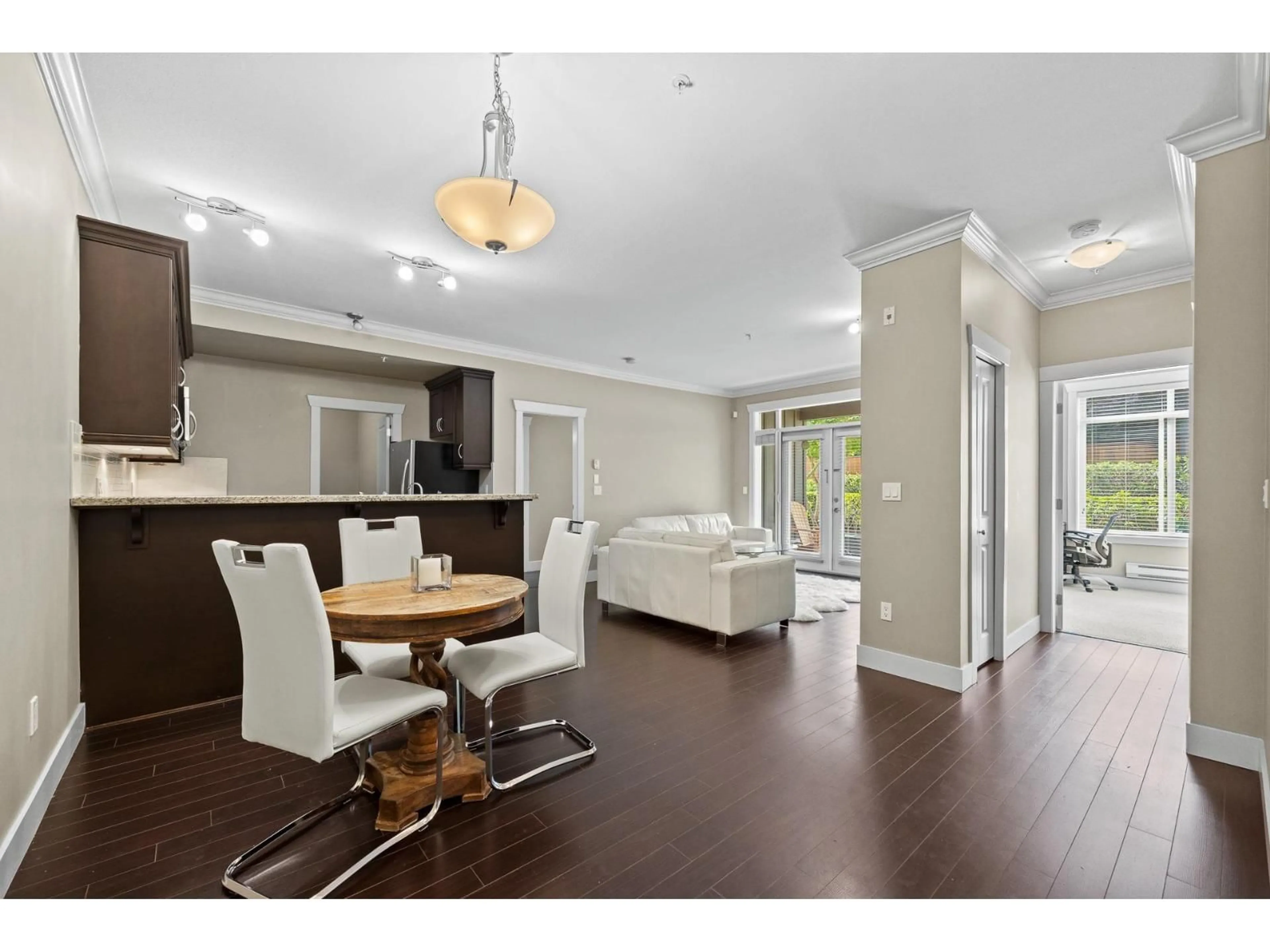 Open concept kitchen, wood/laminate floor for 103 - 15368 17A, Surrey British Columbia V4A1V3