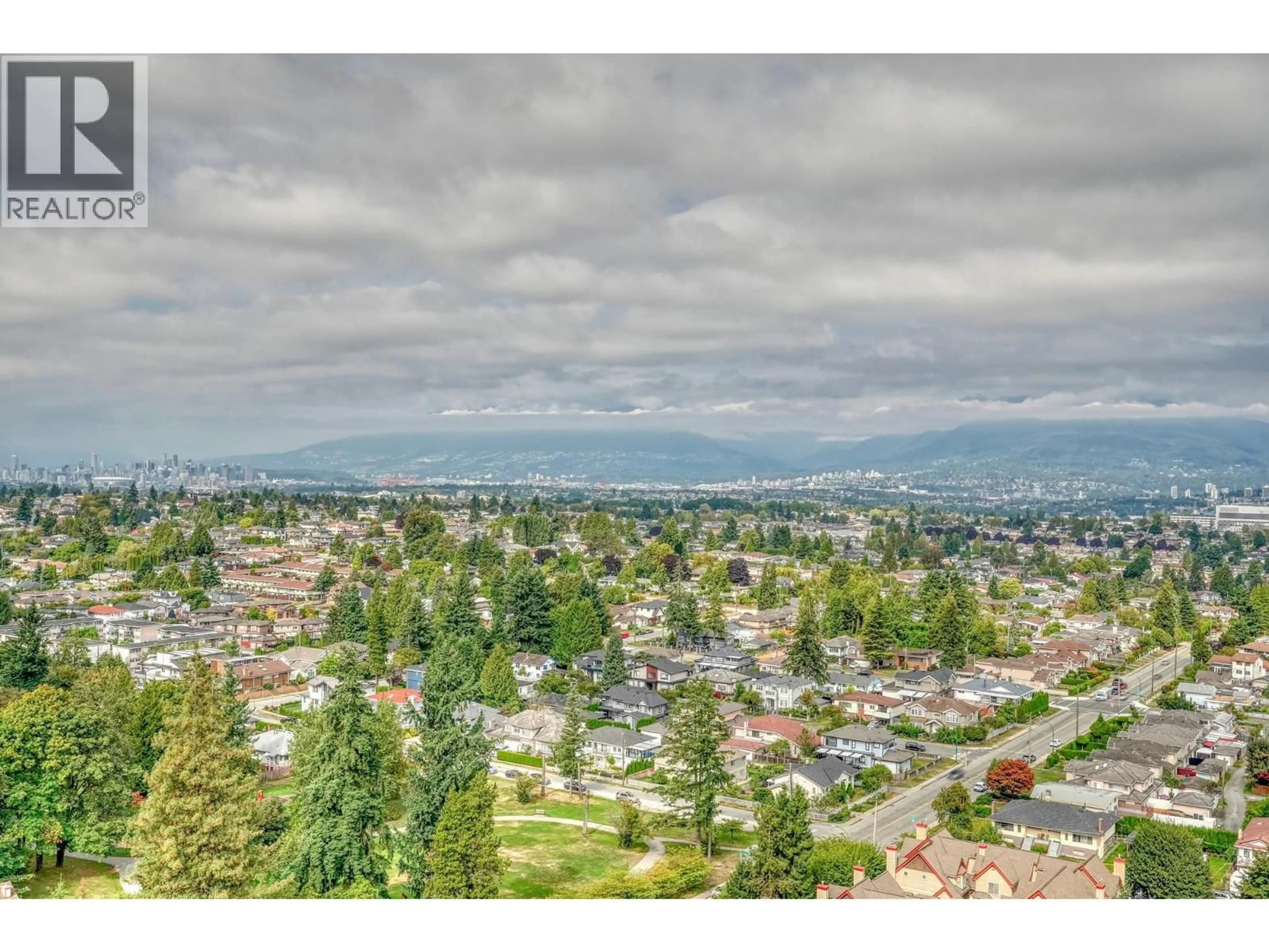 A pic from outside/outdoor area/front of a property/back of a property/a pic from drone, mountain view for 2003 - 4160 SARDIS STREET, Burnaby British Columbia V5H1K2