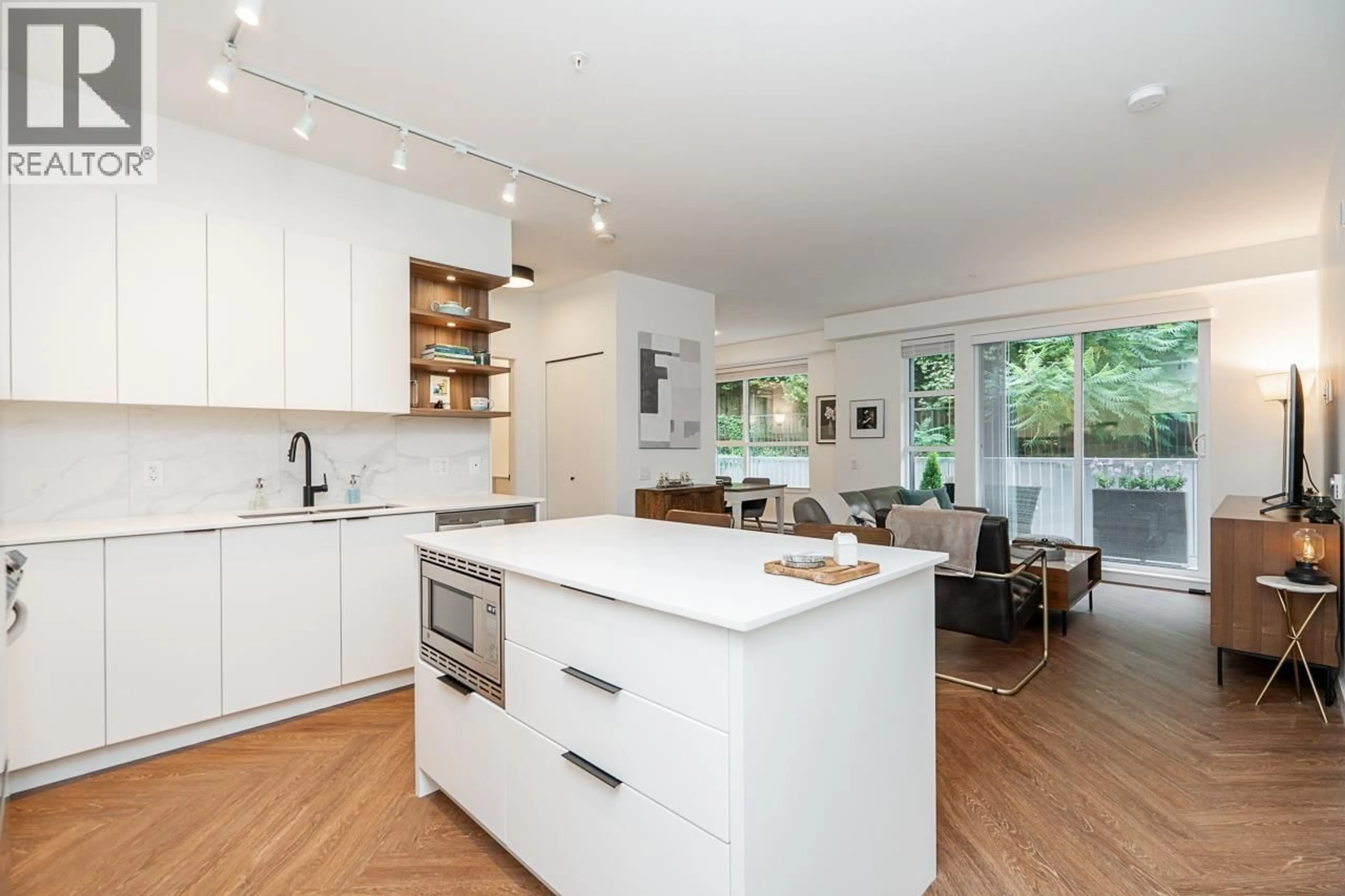 Open concept kitchen, wood/laminate floor for 420 - 3229 ST JOHNS STREET, Port Moody British Columbia V3H0M4