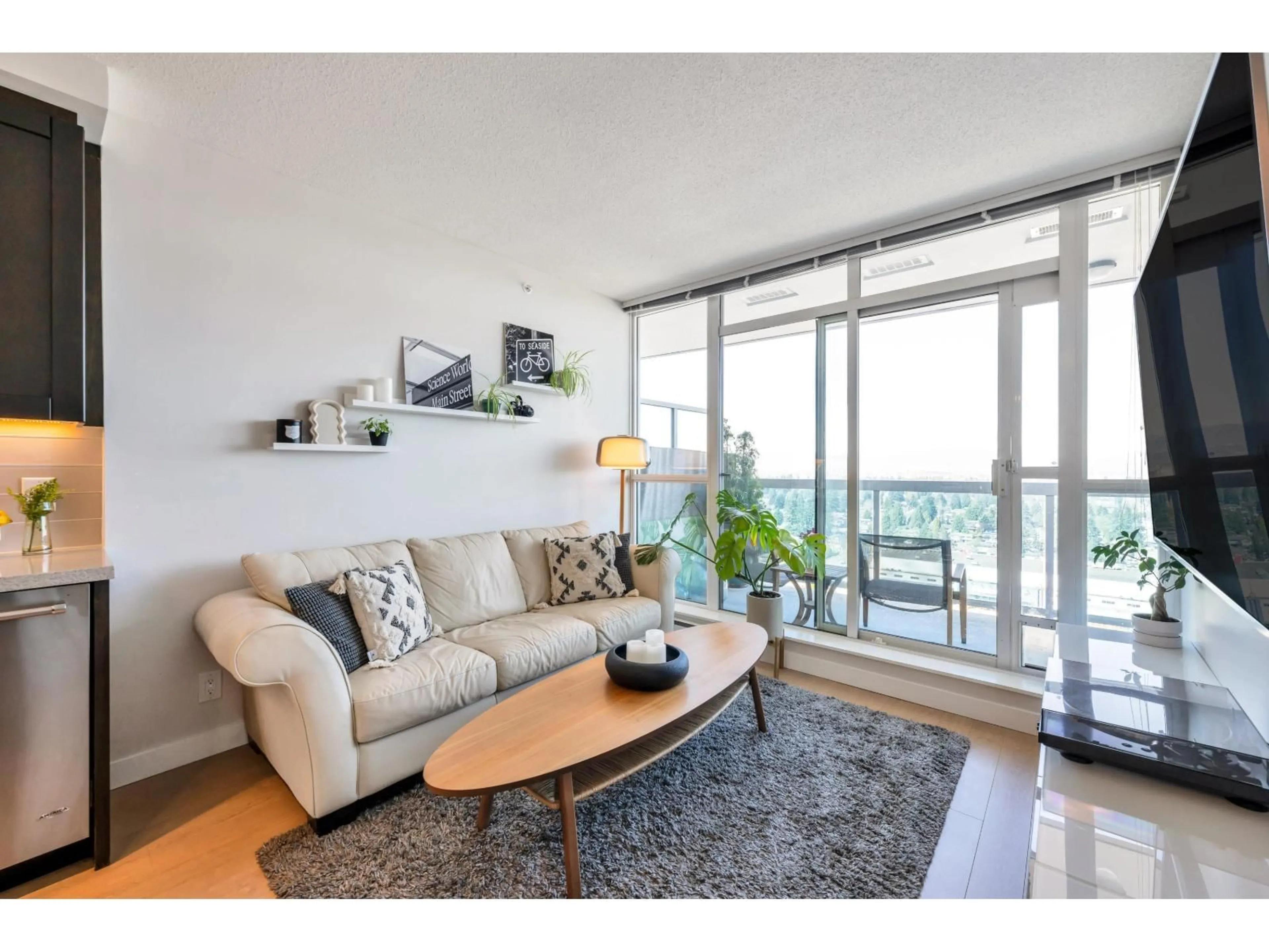 Living room with furniture, wood/laminate floor for 2105 - 11967 80, Delta British Columbia V4C0E2