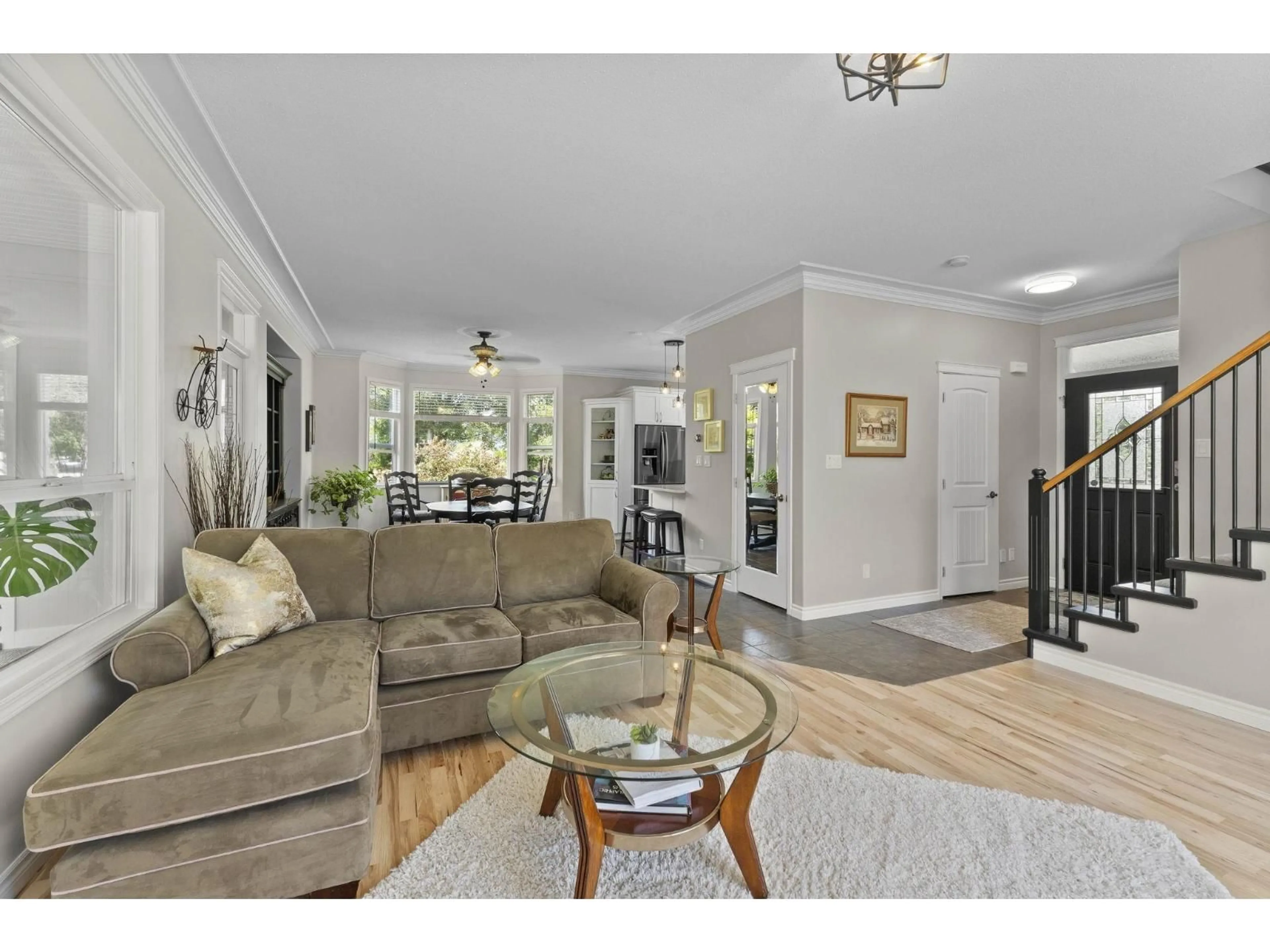 Living room with furniture, wood/laminate floor for 41446 YARROW CENTRAL ROAD, Yarrow British Columbia V2R5G5