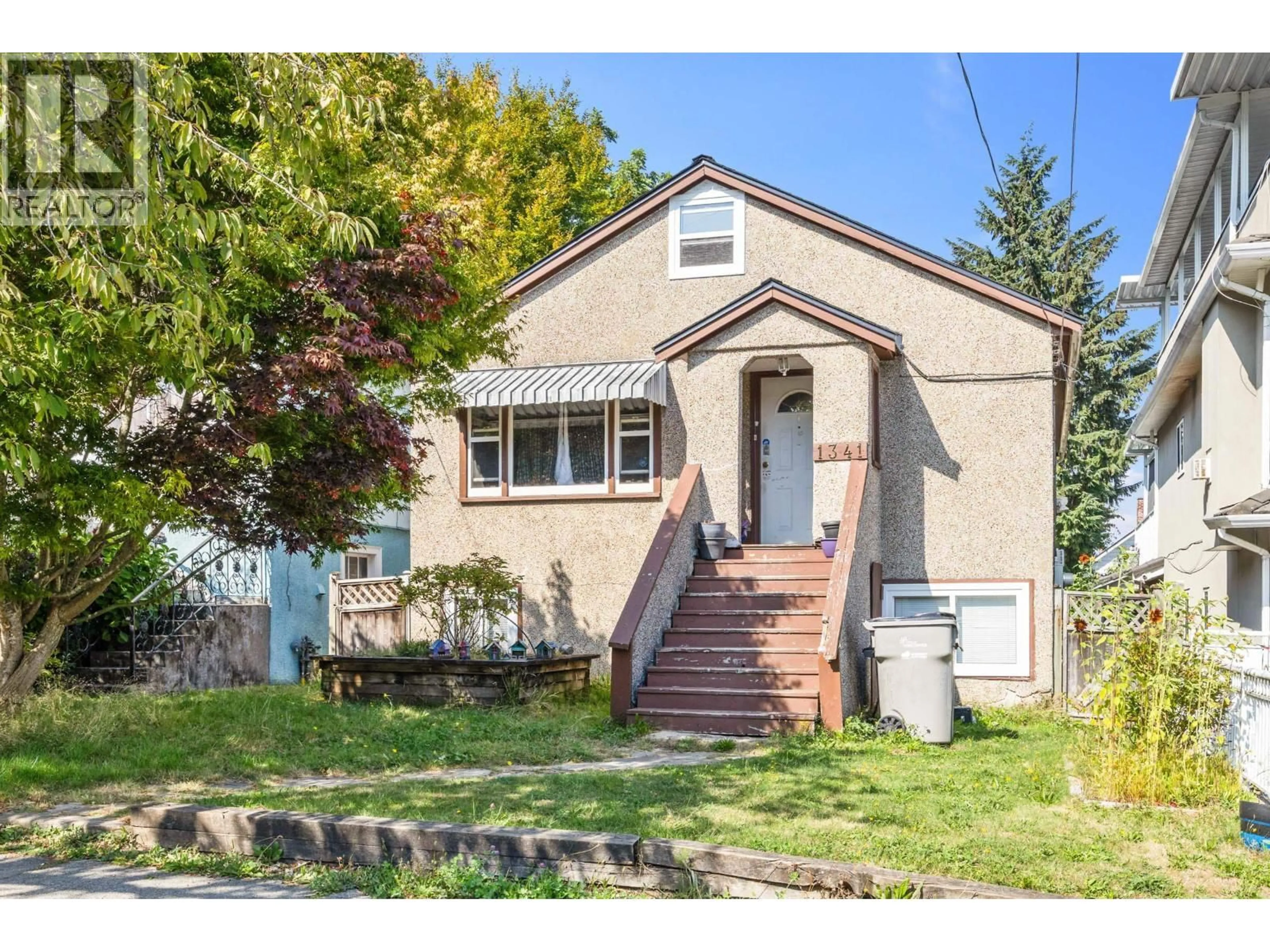 Home with vinyl exterior material, street for 1341 29TH AVENUE, Vancouver British Columbia V5V2T4